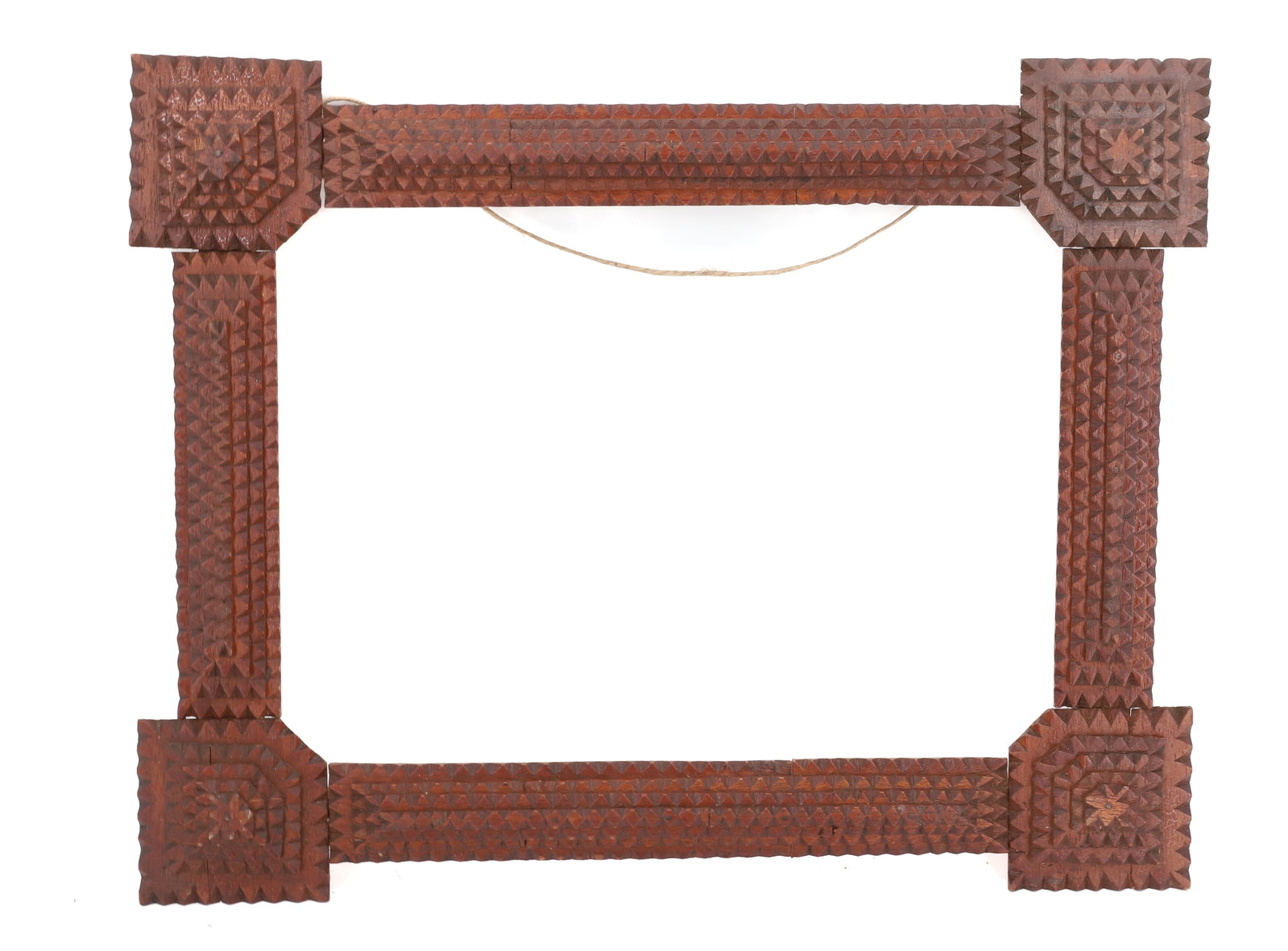 TRAMP ART FRAME: CHIP CARVED IN BROWN SURFACE. 14 1/4" X 18 1/4". PLEASE READ CAREFULLY - Terms for Purchasing and Shipping of Auction Items. Please read carefully before bidding. All payments for purchases will be ma