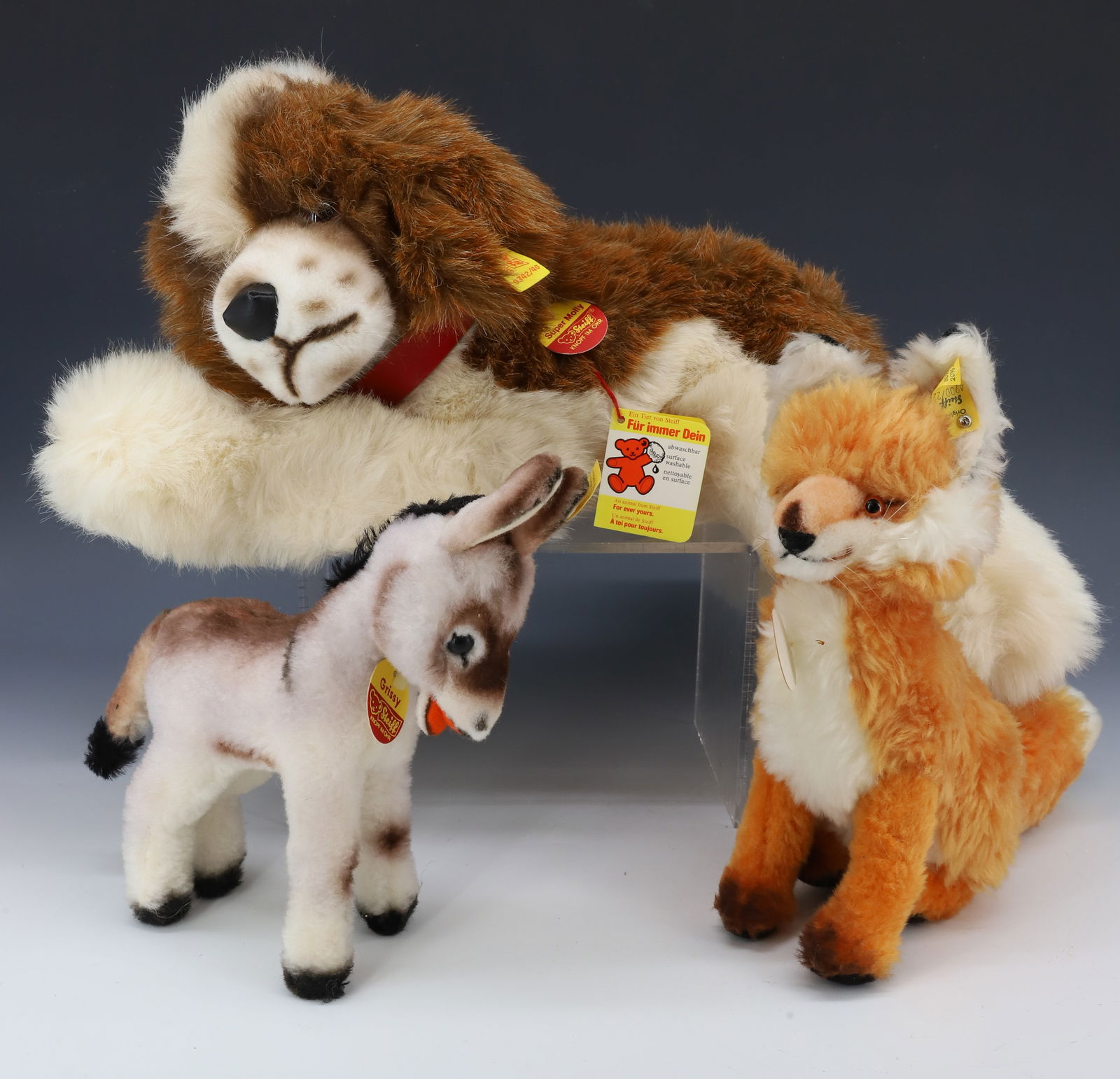 VINTAGE (3) STEIFF SPANIEL DOG, FOX AND DONKEY: SPANIEL DOG, FOX AND DONKEY 8",9", 17" PLEASE READ CAREFULLY - Terms for Purchasing and Shipping of Auction Items. Please read carefully before bidding. All payments for purchases will be made through