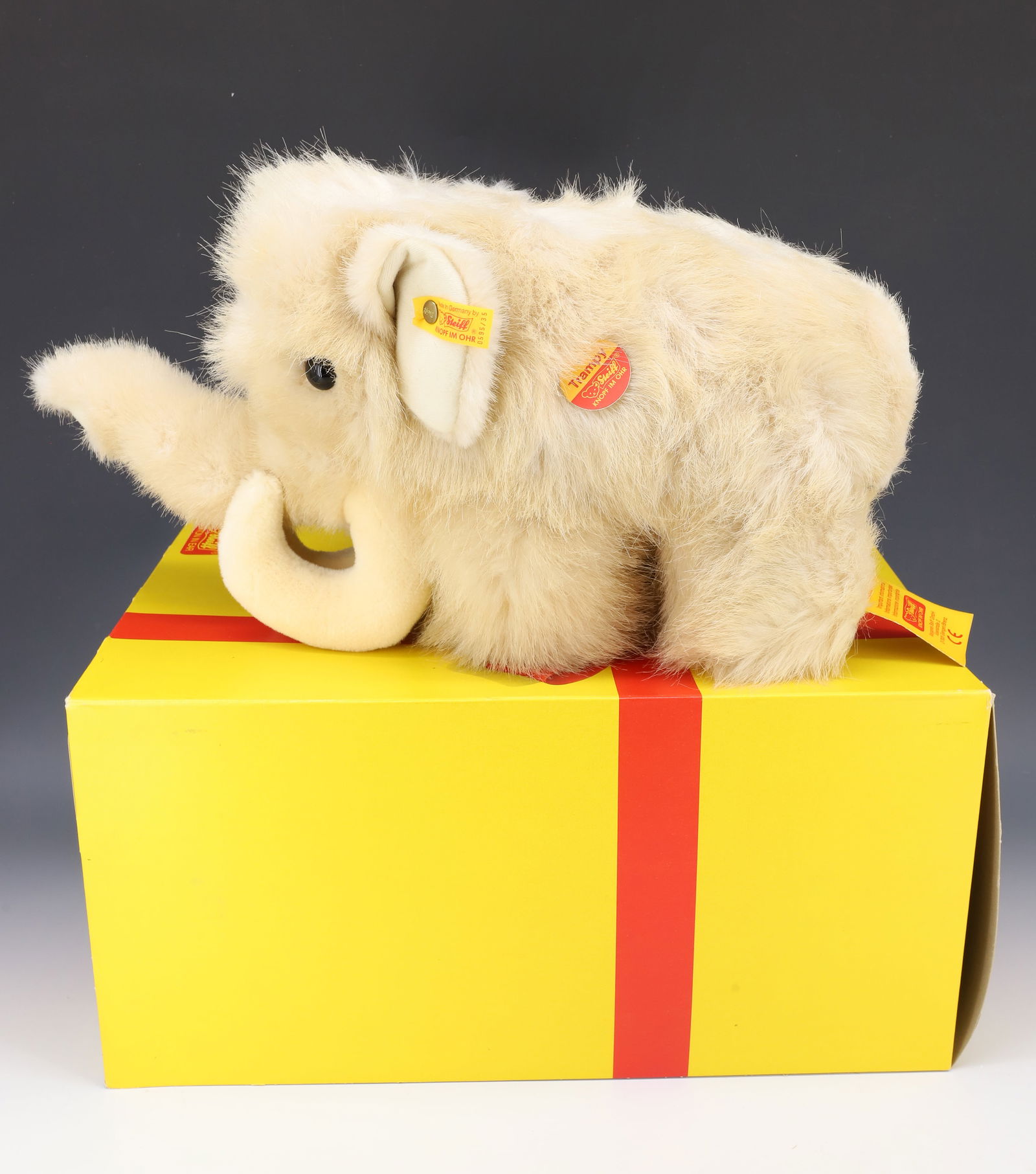 VINTAGE STEIFF MASTADON: MASTODON TRAMPY OFF WHITE BUTTON AND TAG 16" PLEASE READ CAREFULLY - Terms for Purchasing and Shipping of Auction Items. Please read carefully before bidding. All payments for purchases will be made t