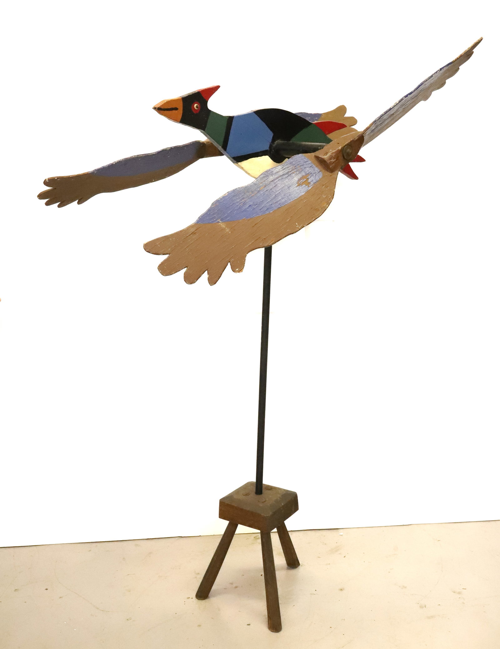 FOLK ART WOODEN BIRD WHIRLIGIG: LARGE BIRD WITH MOVING WINGS. ON EARLY WOODEN TRIPOD BASE. 53" X 43" L. PLEASE READ CAREFULLY - Terms for Purchasing and Shipping of Auction Items. Please read carefully before bidding. All payments f