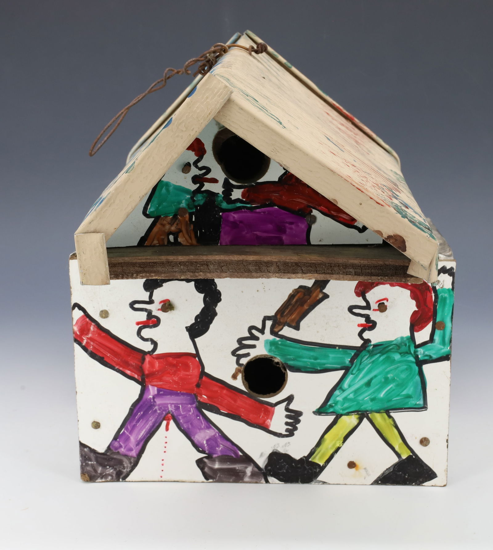 FOLK ART BIRDHOUSE ATTR. IVAN LAYCOCK: WOMAN CHASING MAN WITH ROLLING PIN. 9 1/2" X 8 1/2" X 9". PLEASE READ CAREFULLY - Terms for Purchasing and Shipping of Auction Items. Please read carefully before bidding. All payments for purchases w