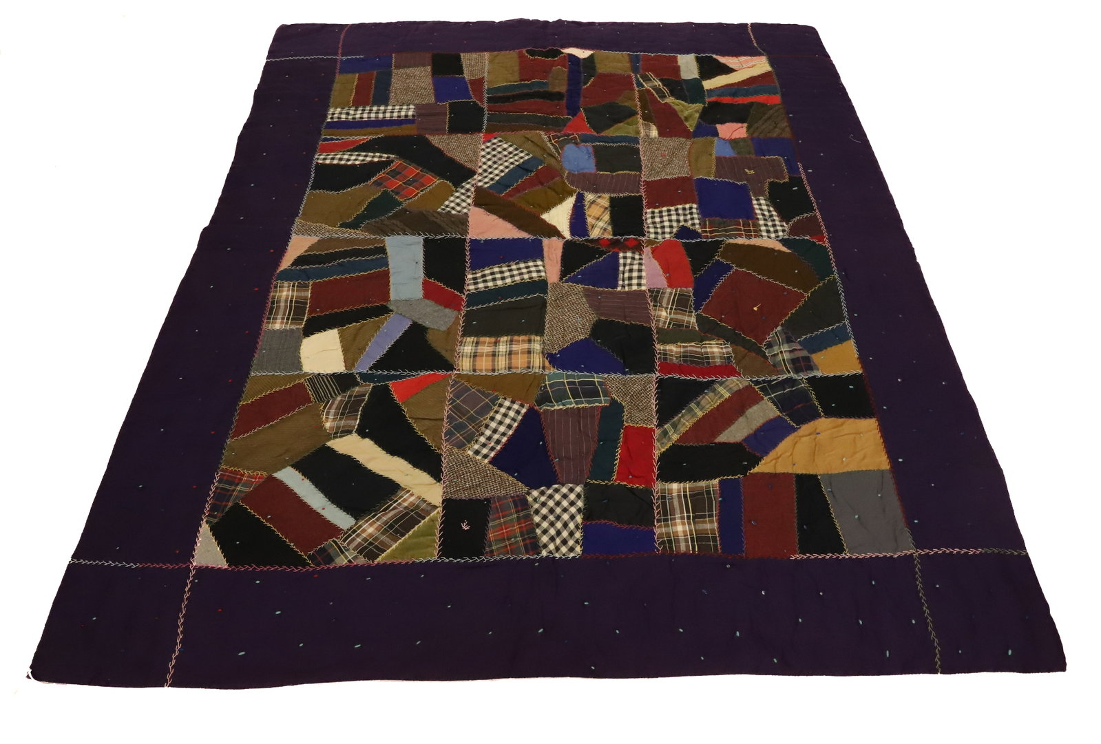 VICTORIAN CRAZY QUILT: WOOL FABRICS WITH PURPLE BORDER. FEATHER/PAISLEY BACKING. 80" X 62". PLEASE READ CAREFULLY - Terms for Purchasing and Shipping of Auction Items. Please read carefully before bidding. All payments for 