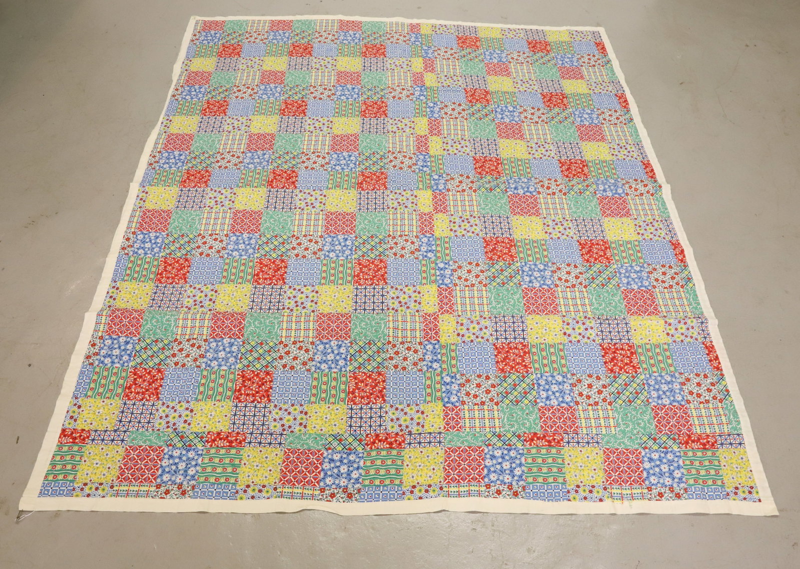 VINTAGE HAND STITCHED QUILT: MACHINE SEWN EDGE. BLOCK PATTERN. MRKD. NEW HOPE 1-98 ON CORNER. APPROX. 62" X 74". PLEASE READ CAREFULLY - Terms for Purchasing and Shipping of Auction Items. Please read carefully before bidding. Al