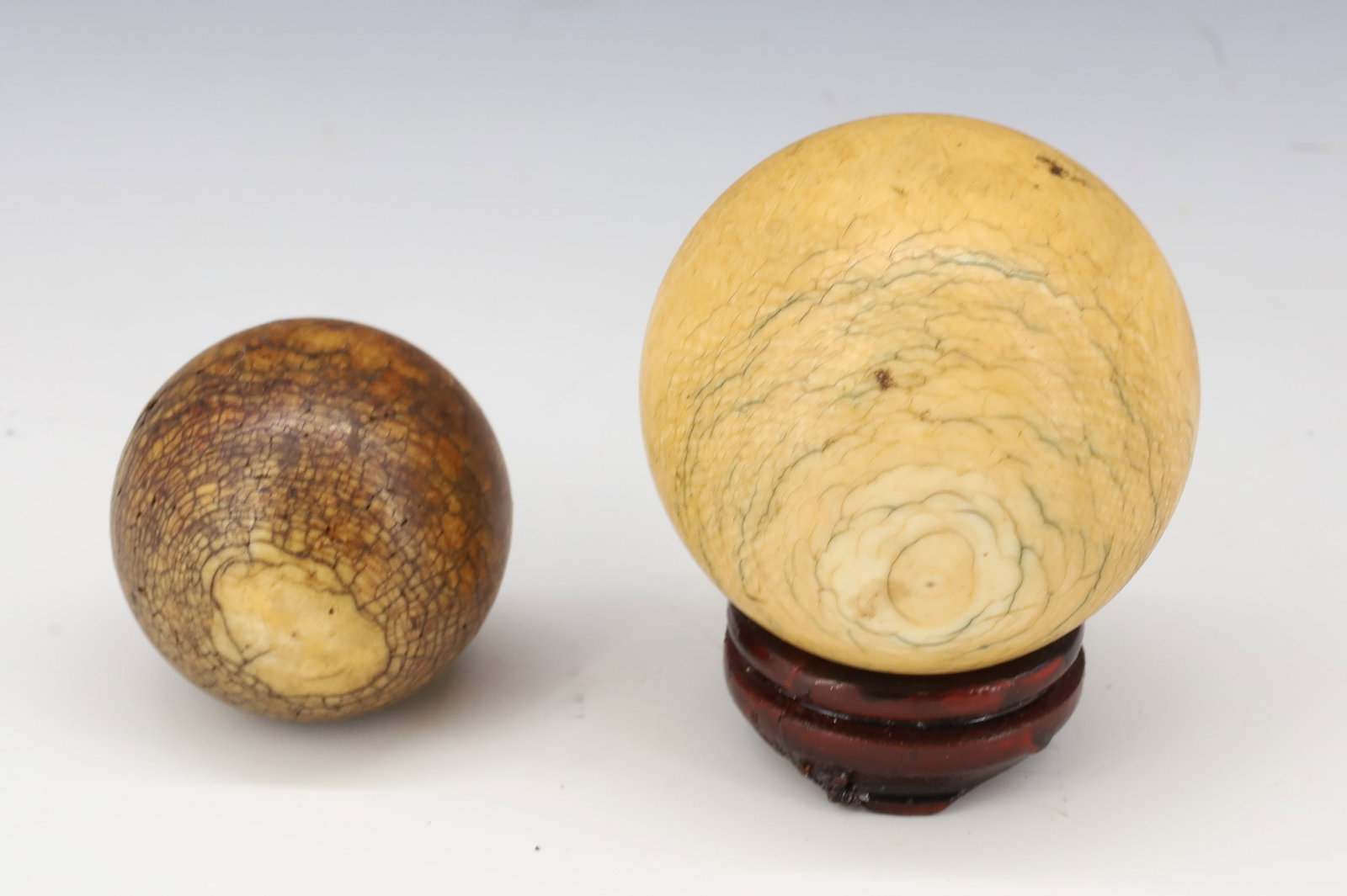 (2) OX BONE BILLIARD BALLS: 1 5/8" AND 2 1/4" APPROX. DIAMETERS. PLEASE READ CAREFULLY - Terms for Purchasing and Shipping of Auction Items. Please read carefully before bidding. All payments for purchases will be made through L