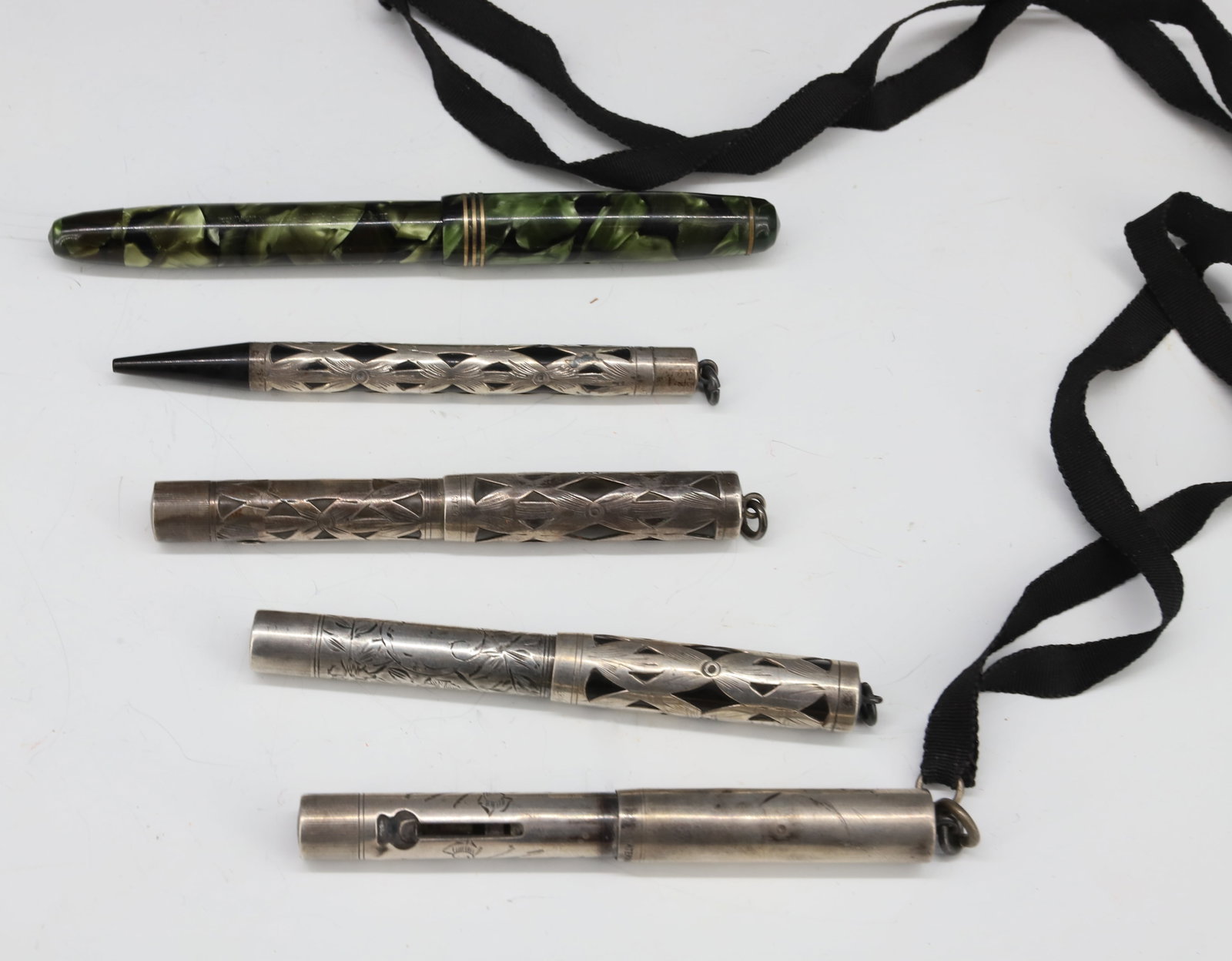 PARKER PEN AND STERLING SILVER PEN AND PENCIL LOT: PARKER PEN WITH 14KT GOLD PLATED TIP, (3) WATERMAN STERLING PENS, AND WATERMAN STERLING PENCIL PLEASE READ CAREFULLY - Terms for Purchasing and Shipping of Auction Items. Please read carefully before 
