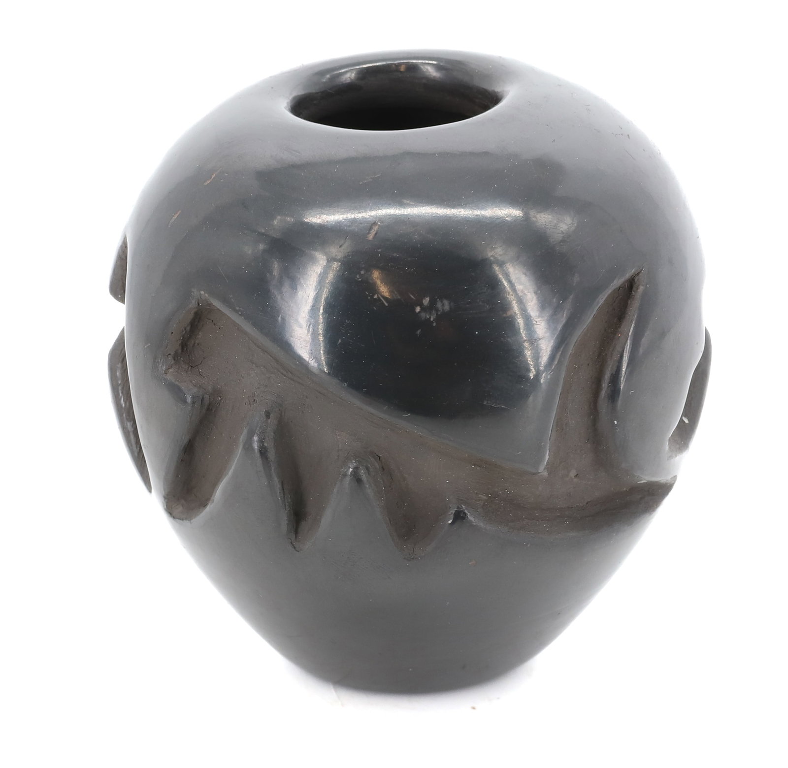 FRANCIS NARANJO SANTA CLARA POT: CARVED POT. SGND. ON THE BOTTOM. 3 3/4" H. PLEASE READ CAREFULLY - Terms for Purchasing and Shipping of Auction Items. Please read carefully before bidding. All payments for purchases will be made thr