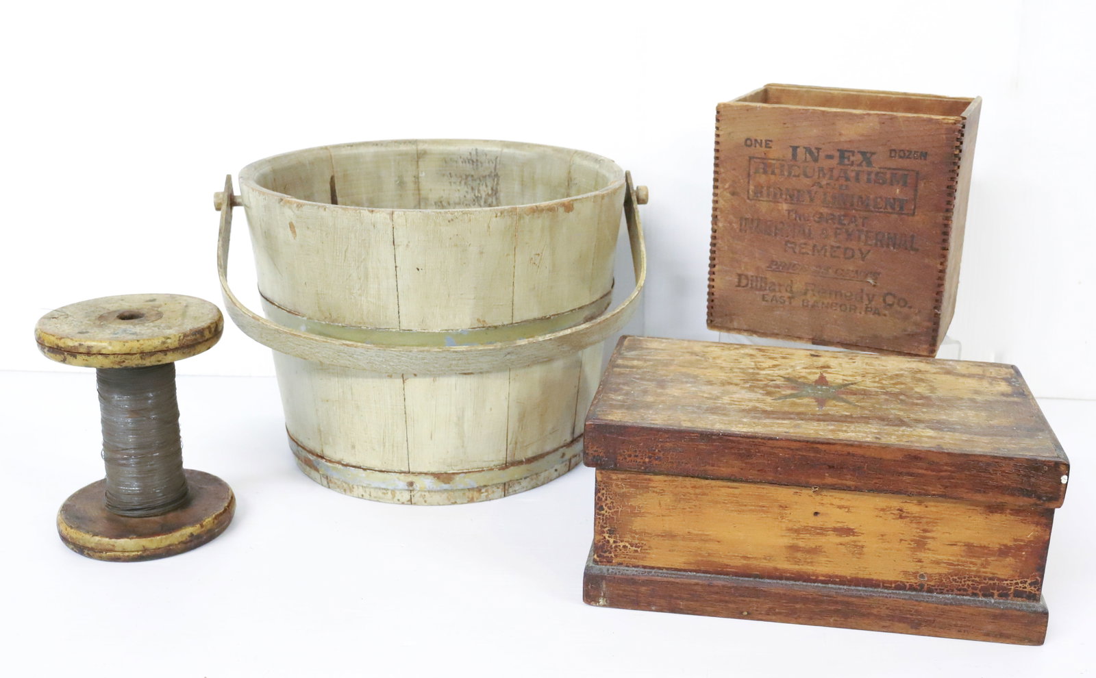 LOT OF WOODENWARE: INCLUDING: DECORATED LIFT-LID BOX 5" X 12" X 7", ADVERTISING MEDICINE BOX MRKD. "EAST BANGOR, PA" 7 1/2" X 7 1/2" X 5 1/2", WOODEN BUCKET WITH HANDLE 12 1/2" AND SPOOL WITH WIRE. PLEASE READ CAREFULLY