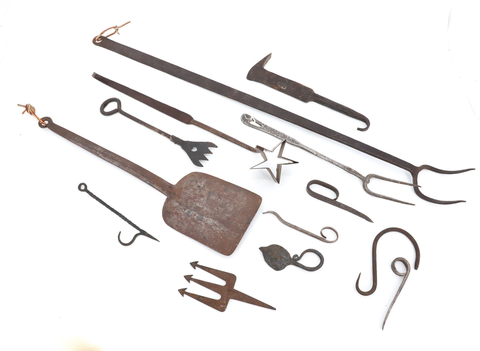 LOT OF WROUGHT IRON: INCLUDING: LARGE IRON FORK 30" L., METAL SPATULA 16 1/2", STAR CUTTER WITH HANDLE AND MORE. PLEASE READ CAREFULLY - Terms for Purchasing and Shipping of Auction Items. Please read carefully before bid