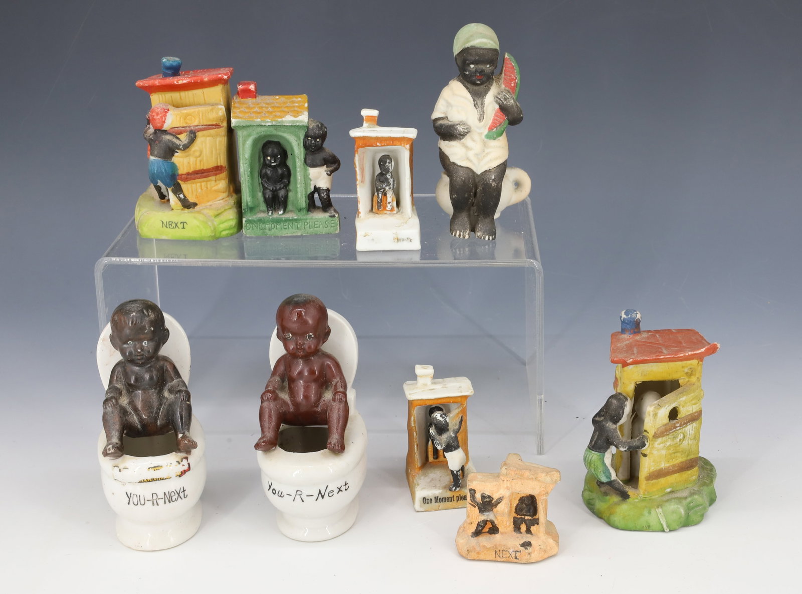 LOT OF BLACK AMERICANA: PORCELAIN AND BISQUE PAINTED FIGURES. SOME STAMPED "JAPAN". 1 1/2" TO 4" HEIGHTS. PLEASE READ CAREFULLY - Terms for Purchasing and Shipping of Auction Items. Please read carefully before bidding. All 