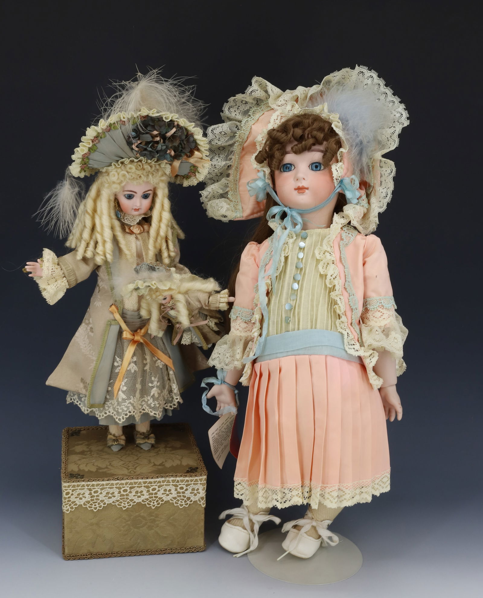 (2) VINTAGE DOLL AND AUTOMATON MUSIC BOX: VICTORIAN STYLE DOLL WITH MUSIC BOX AUTOMATON AND CAREWELL PORCELAIN HEADED DOLL ,WIG AND DRESS 18"H PLEASE READ CAREFULLY - Terms for Purchasing and Shipping of Auction Items. Please read carefully b