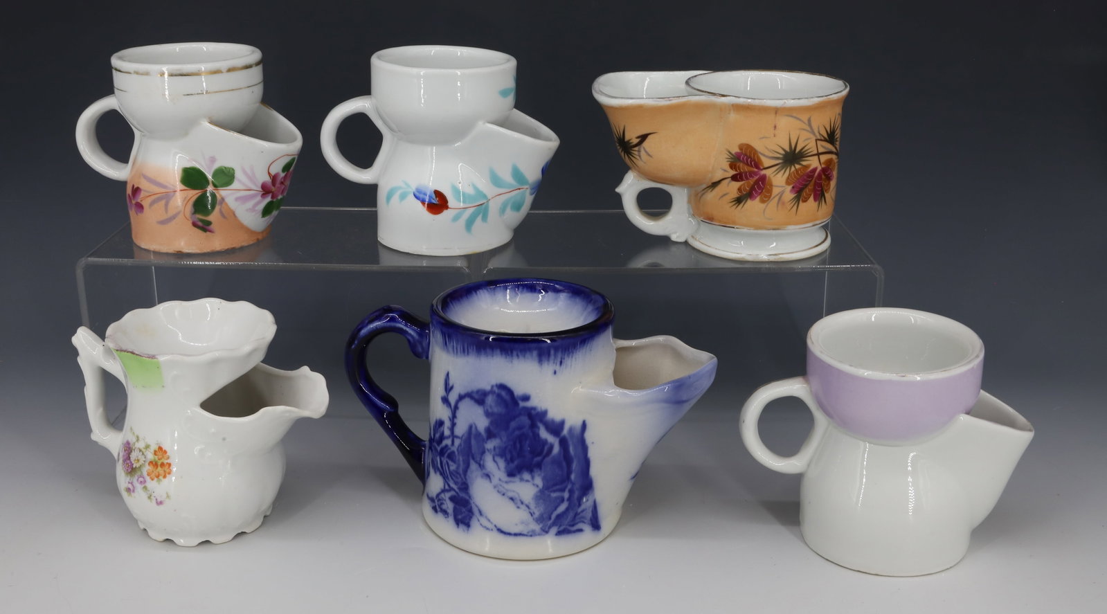 SIX ANTIQUE SCUTTLE SHAVING MUGS: ALL DIFFERENT SIZES AND PATTERNS PLEASE READ CAREFULLY - Terms for Purchasing and Shipping of Auction Items. Please read carefully before bidding. All payments for purchases will be made through LiveA
