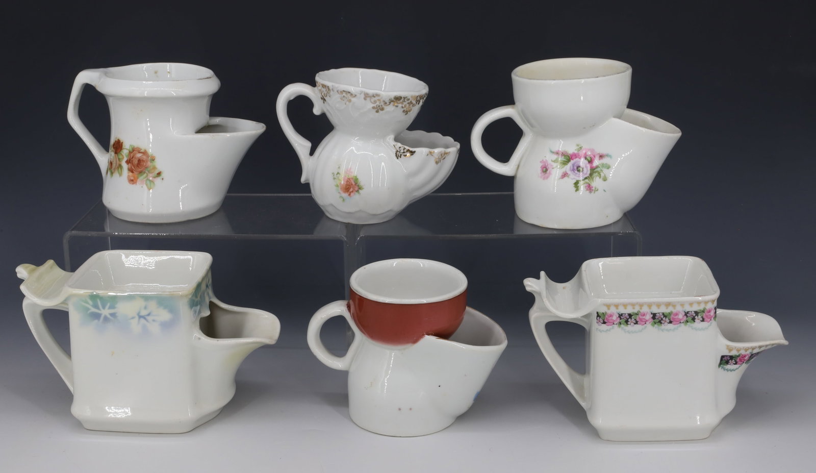 SIX ANTIQUE SCUTTLE SHAVING MUGS: ALL DIFFERENT SIZES AND PATTERNS PLEASE READ CAREFULLY - Terms for Purchasing and Shipping of Auction Items. Please read carefully before bidding. All payments for purchases will be made through LiveA