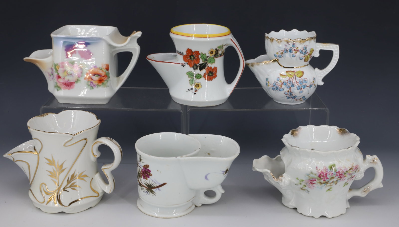 SIX ANTIQUE SCUTTLE SHAVING MUGS: ALL DIFFERENT SIZES AND PATTERNS PLEASE READ CAREFULLY - Terms for Purchasing and Shipping of Auction Items. Please read carefully before bidding. All payments for purchases will be made through LiveA