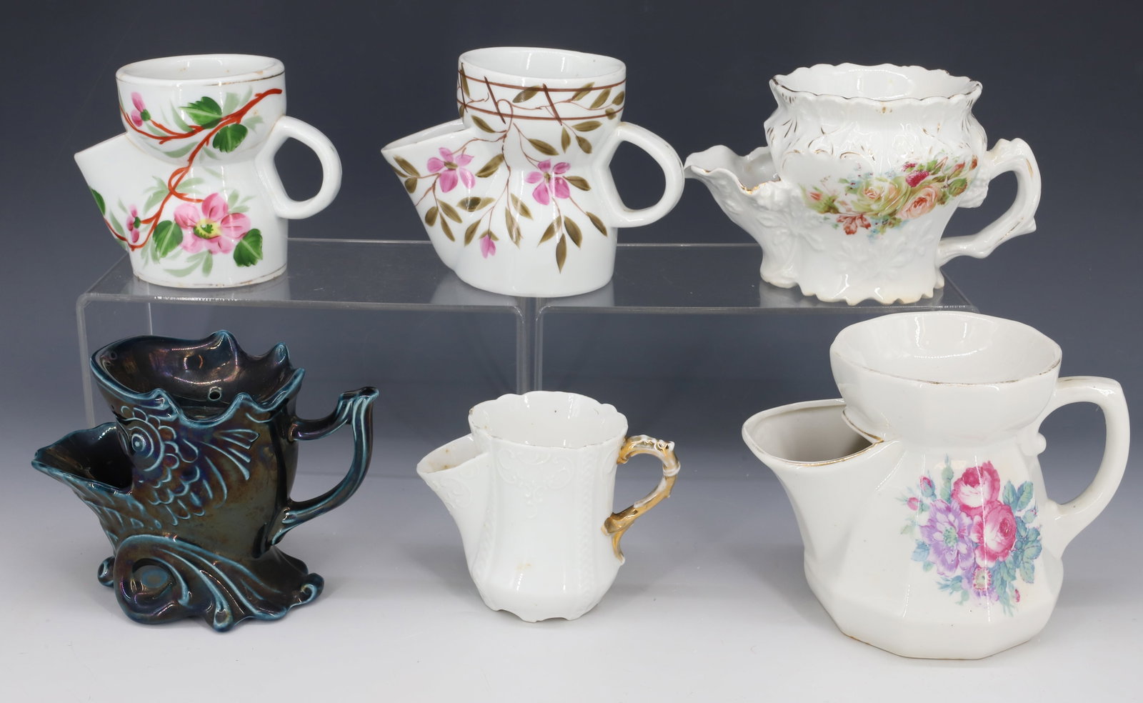 SIX ANTIQUE SCUTTLE SHAVING MUGS: ALL DIFFERENT SIZES AND PATTERNS PLEASE READ CAREFULLY - Terms for Purchasing and Shipping of Auction Items. Please read carefully before bidding. All payments for purchases will be made through LiveA