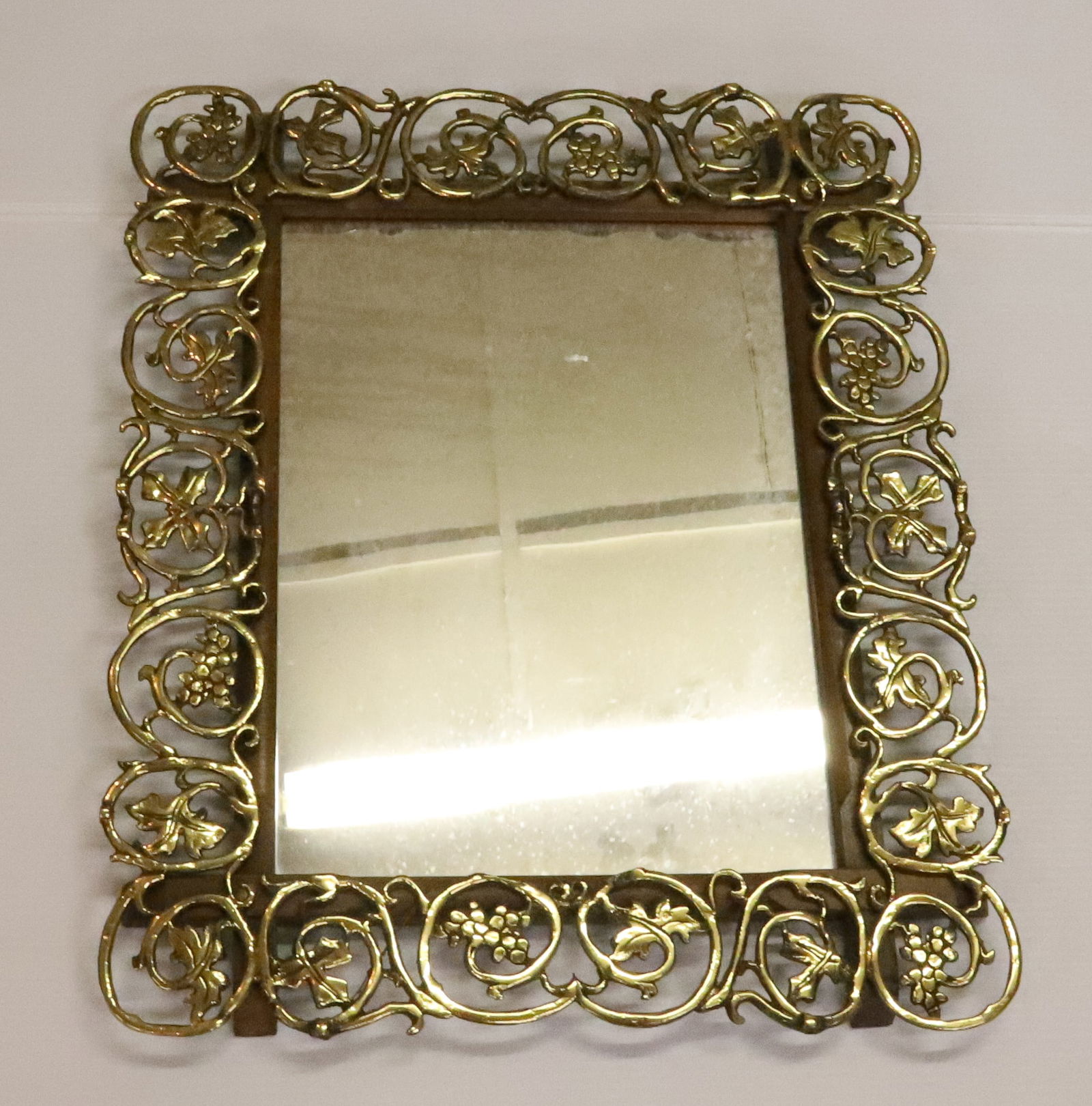 ANTIQUE ORNATE FANCY BRASS WALL MIRROR: BRASS GRAPE AND LEAF DESIGN WALL MIRROR PLEASE READ CAREFULLY - Terms for Purchasing and Shipping of Auction Items. Please read carefully before bidding. All payments for purchases will be made throug