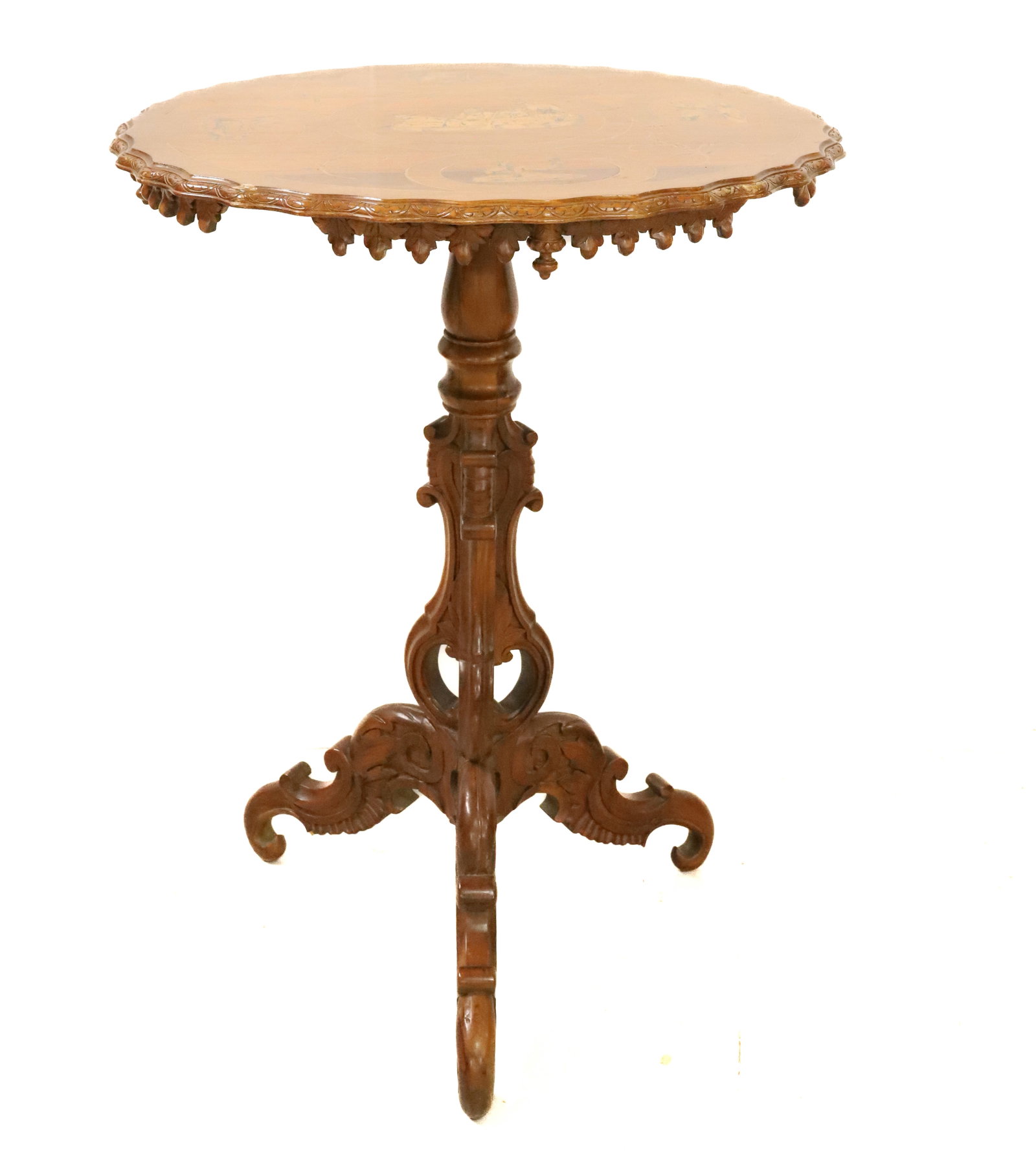 ORNATE TILT TOP STAND: MAHOGANY TILT TOP STAND WITH CARVED BASE PLEASE READ CAREFULLY - Terms for Purchasing and Shipping of Auction Items. Please read carefully before bidding. All payments for purchases will be made throu