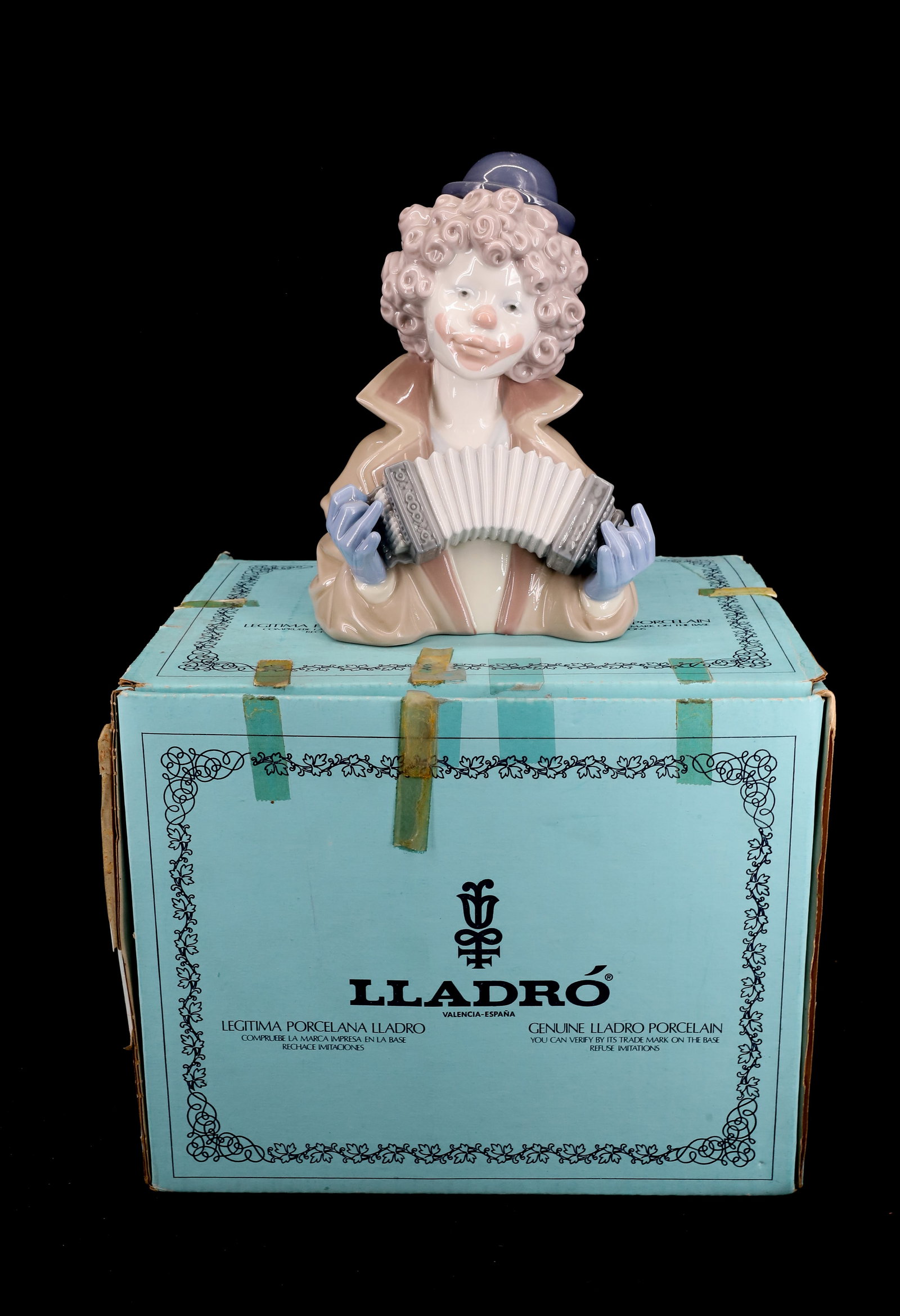 VINTAGE LLADRO 5585 FINE MELODY CLOWN BUST: IN BOX 7"H PLEASE READ CAREFULLY - Terms for Purchasing and Shipping of Auction Items. Please read carefully before bidding. All payments for purchases will be made through LiveAuctioneers.com payment