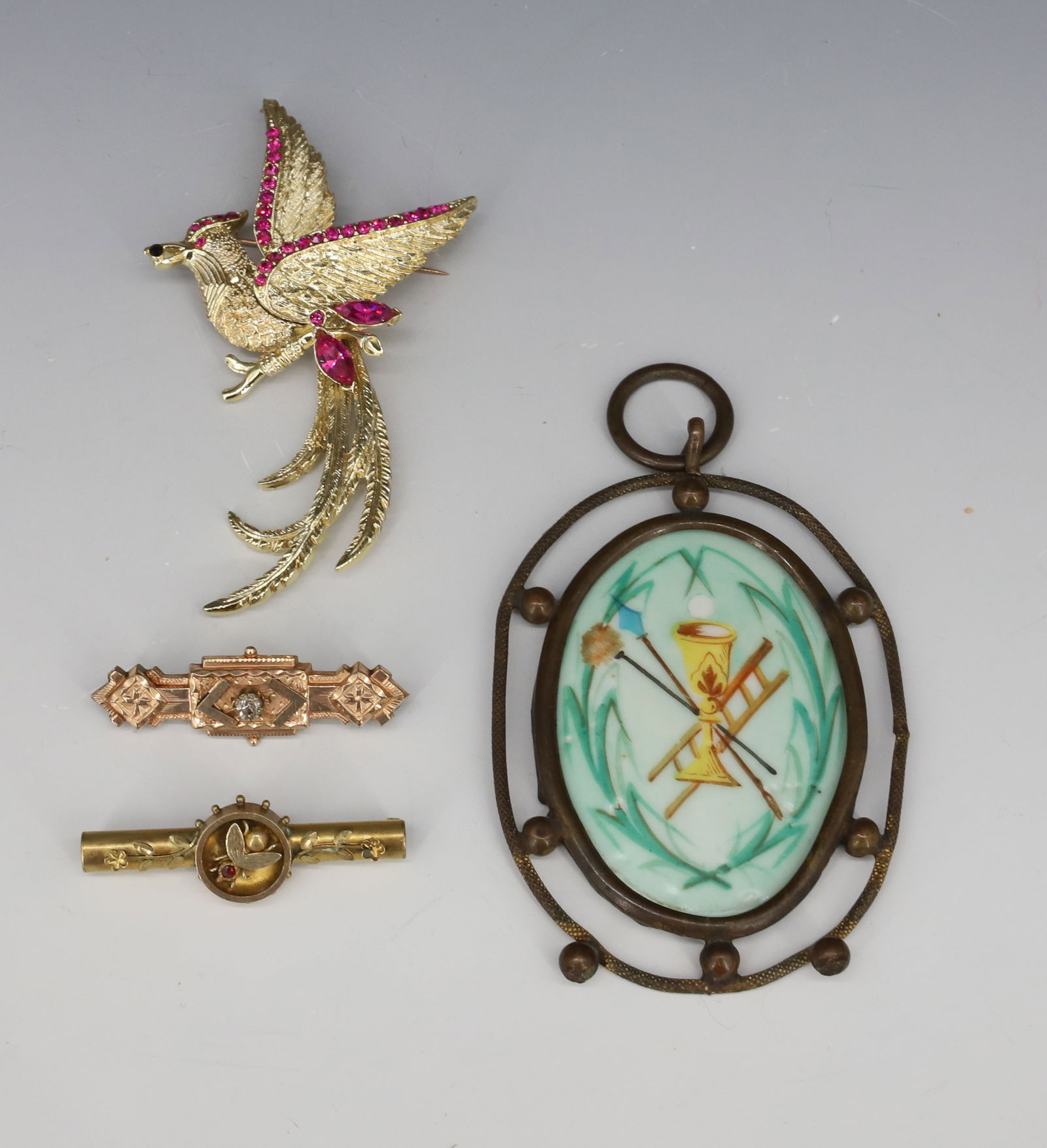 VICTORIAN JEWELRY AND COSTUME JEWELRY: TWO MID 19TH CENTURY GOLD FILLED BAR PINS , MASONIC JEWEL HAND PAINTED PORCELAIN IN BRASS FRAME AND COSTUME JEWELRY PHOENIX BIRD BROOCH 2"L,4 1/4"H,3 3/4"H PLEASE READ CAREFULLY - Terms for Purchasing