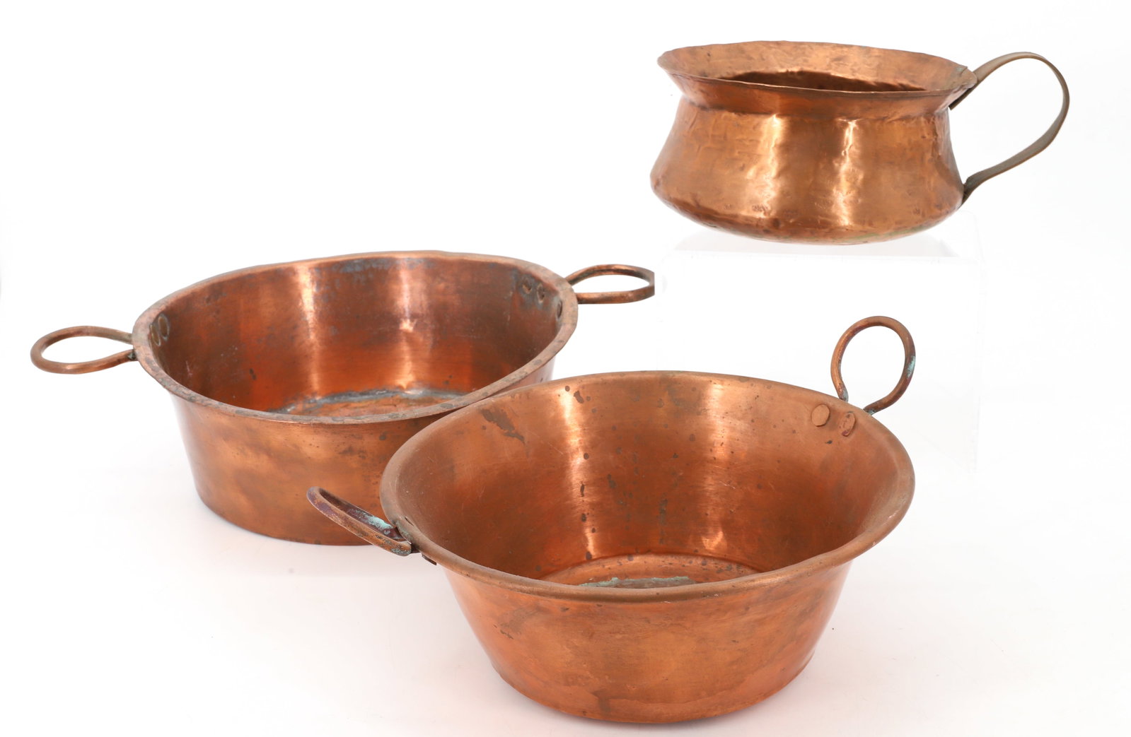 (3) PRIMITIVE COPPER POTS: TWO WITH DOUBLE COPPER HANDLES, AND SINGLE HANDLE POT TWO WITH DOVETAILS 4 " X 9 1/2" , 3 1/2" X 9 1/2", 3 1/2" X 10"DIA PLEASE READ CAREFULLY - Terms for Purchasing and Shipping of Auction Items. Ple