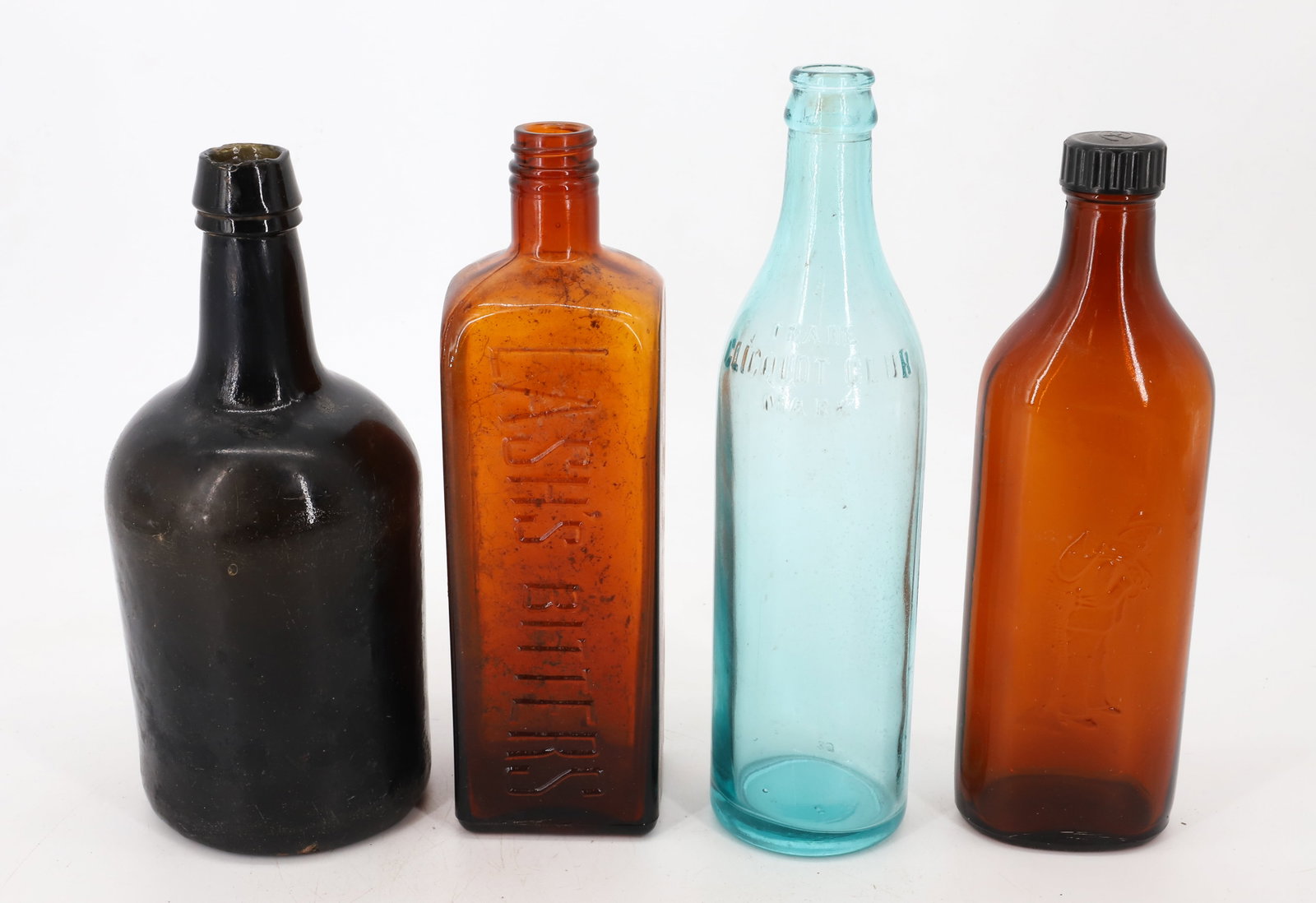 (4) 18TH CENTURY ENGLISH BLACK GLASS BOTTLE AND LASH'S BITTERS, CLICQUOT CLUB: LASH'S BITTERS AMBER SCREW TOP, CLICQUOT CLUB AQUA BOTTLE AND SCREW TOP BITTERS PLEASE READ CAREFULLY - Terms for Purchasing and Shipping of Auction Items. Please read carefully before bidding. All pa