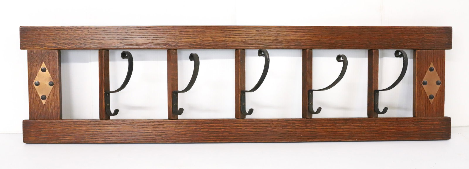ART & CRAFTS COAT/HAT RACK: FIVE SWING OUT IRON HOOKS, DIAMOND SHAPE COPPER DECORATION WITH ROSE HEAD NAILS 11" X 40 1/2" PLEASE READ CAREFULLY - Terms for Purchasing and Shipping of Auction Items. Please read carefully before b