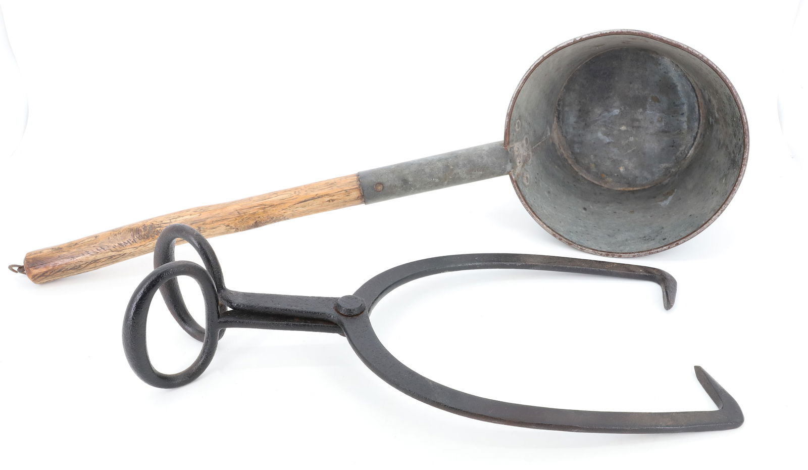 (2) ANTIQUE TIN DIPPER AND ICE TONGS: TINWORK DIPPER WITH WOOD HANDLE WITH HANG RING, CAST IRON ICE TONGS 26" X 8", 18" PLEASE READ CAREFULLY - Terms for Purchasing and Shipping of Auction Items. Please read carefully before bidding. All