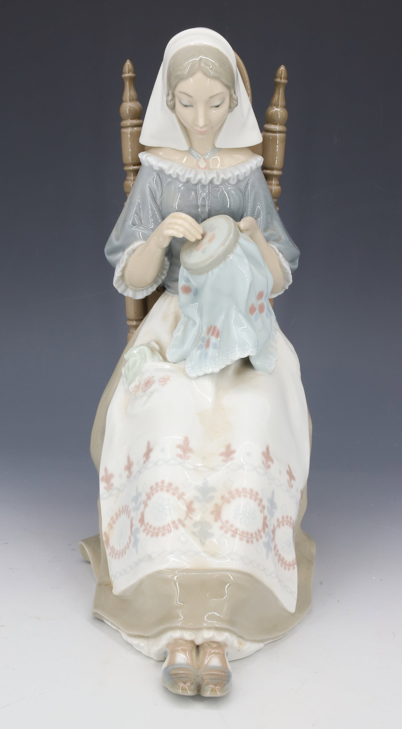 VINTAGE LLADRO FIGURINE 4865: THE EMBROIDERER LLADRO FIGURINE 12" PLEASE READ CAREFULLY - Terms for Purchasing and Shipping of Auction Items. Please read carefully before bidding. All payments for purchases will be made through Li