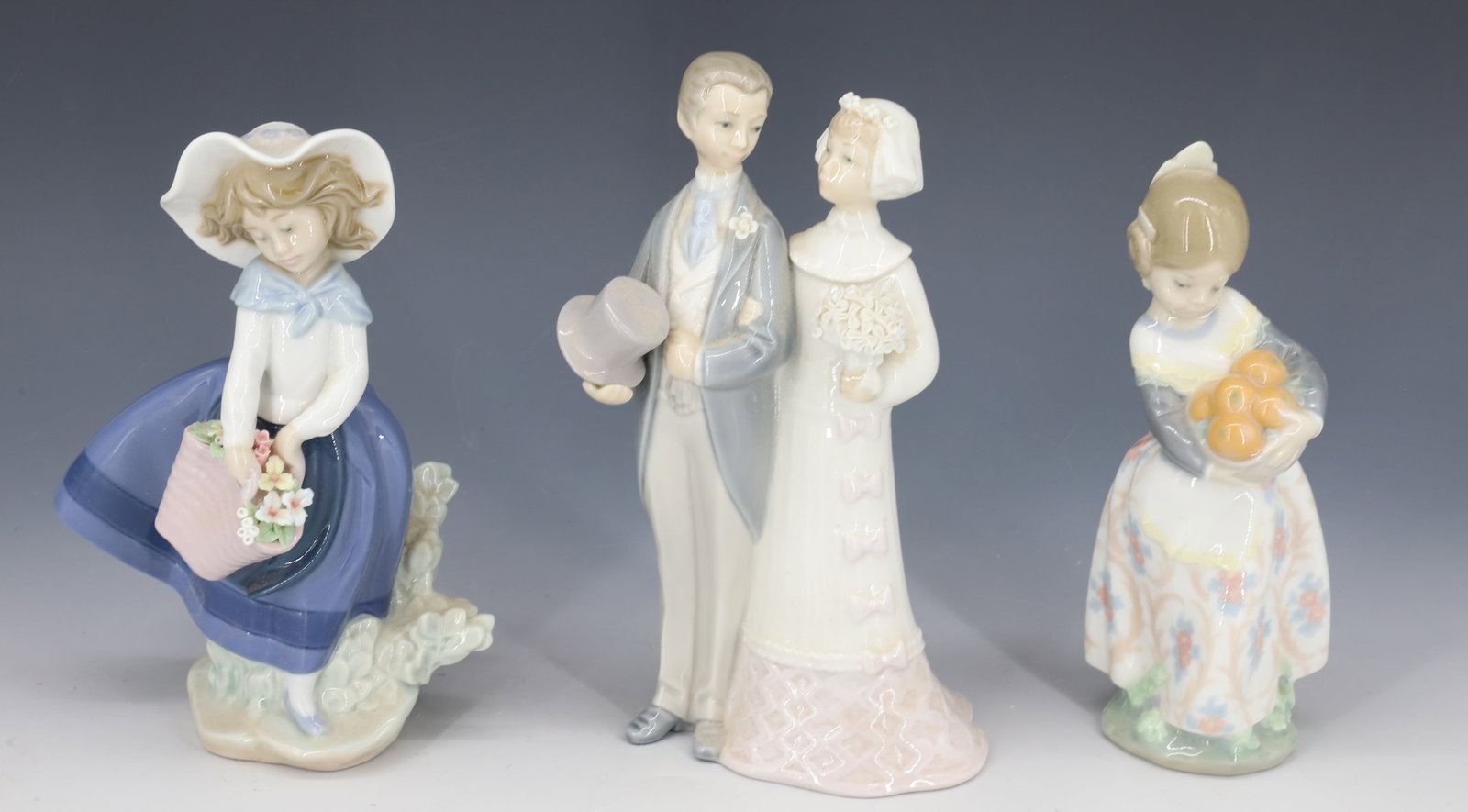 (3) VINTAGE LLADRO FIGURINES: GIRL WITH FRUIT, WEDDING COUPLE AND FLOWER GIRL 6 3/4" TO 8" PLEASE READ CAREFULLY - Terms for Purchasing and Shipping of Auction Items. Please read carefully before bidding. All payments for purchase