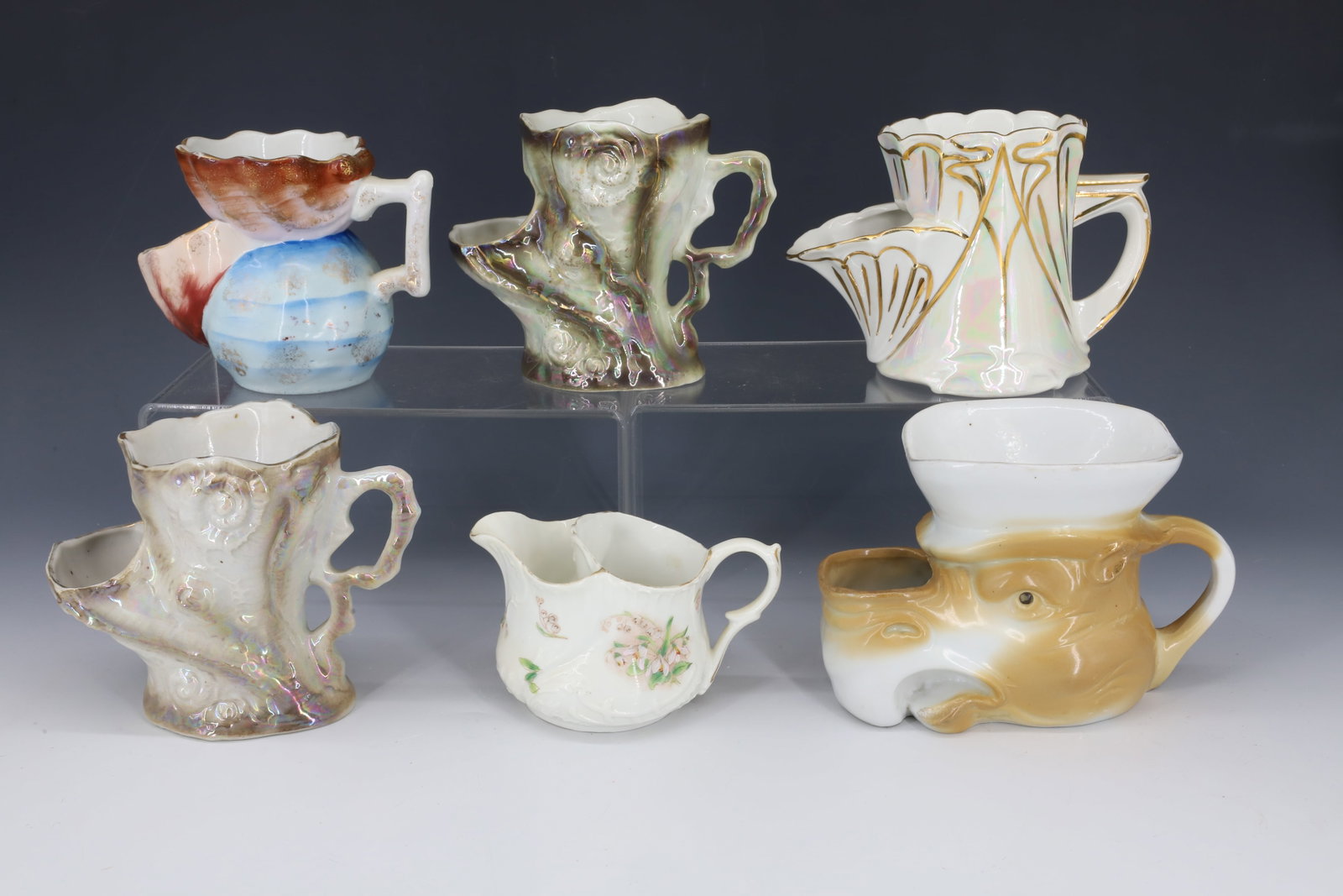 (5) ANTIQUE SCUTTLE SHAVING CUPS: RARE FIGURAL HIPPO, THREE FIGURAL SHELL AND WAVE, BAVARIA GERMANY 2 1/2" TO 4 1/2"H PLEASE READ CAREFULLY - Terms for Purchasing and Shipping of Auction Items. Please read carefully before bidding. Al