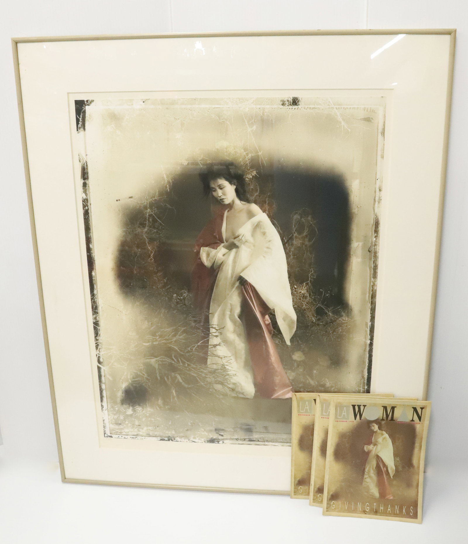 VINTAGE KIM CANAZZI PHOTOGRAPHY "TONG SU": PHOTOGRAPH OF ORIGINAL WITH THREE MAGAZINES FEATURING PHOTO ON COVER 1986 39 1/2" X 32 1/2" PLEASE READ CAREFULLY - Terms for Purchasing and Shipping of Auction Items. Please read carefully before bid
