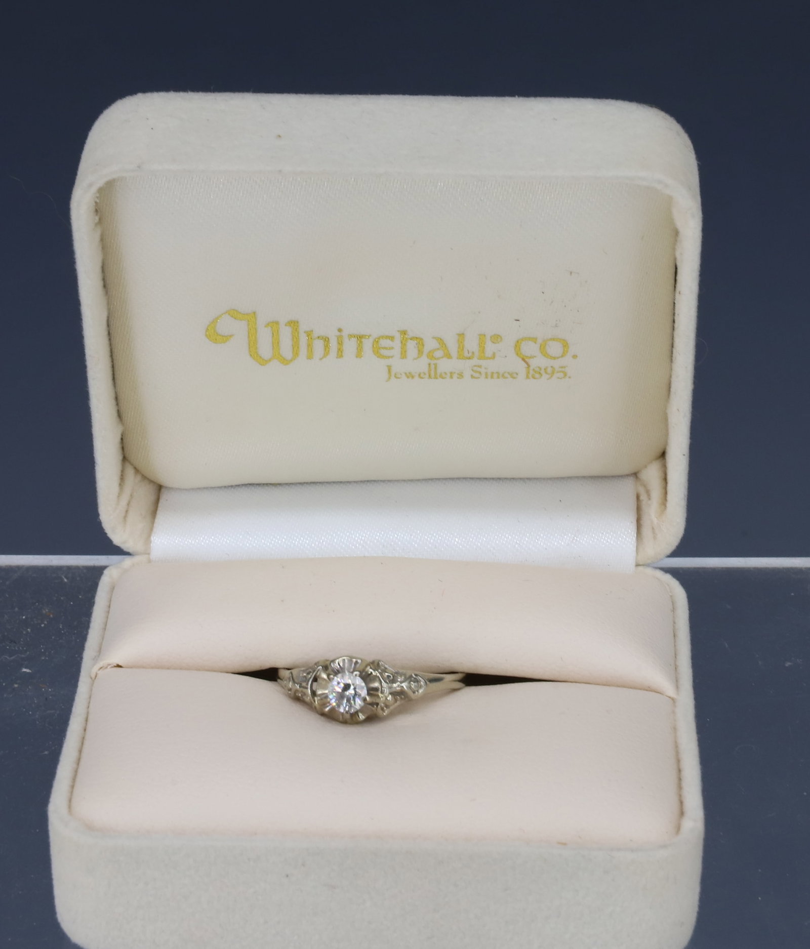 18K WHITE GOLD DIAMOND RING: SIZE 6 DIAMOND APPROXIMATELY 18/20 POINTS TOTAL WEIGHT 1. DWT PLEASE READ CAREFULLY - Terms for Purchasing and Shipping of Auction Items. Please read carefully before bidding. All payments for purchas