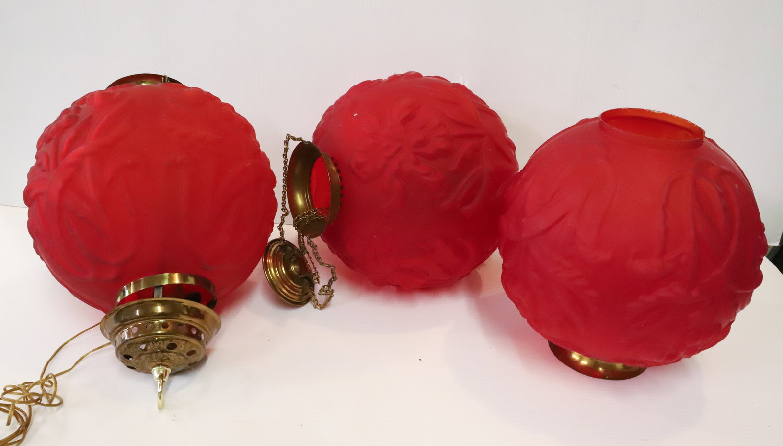 (3) PITTSBURGH RED SATIN HANGING LIGHTS AND SHADE: TWO HANGING LAMPS NOT ELECTRIFIED, ONE SHADE 16"H, 10"H PLEASE READ CAREFULLY - Terms for Purchasing and Shipping of Auction Items. Please read carefully before bidding. All payments for purchases wil