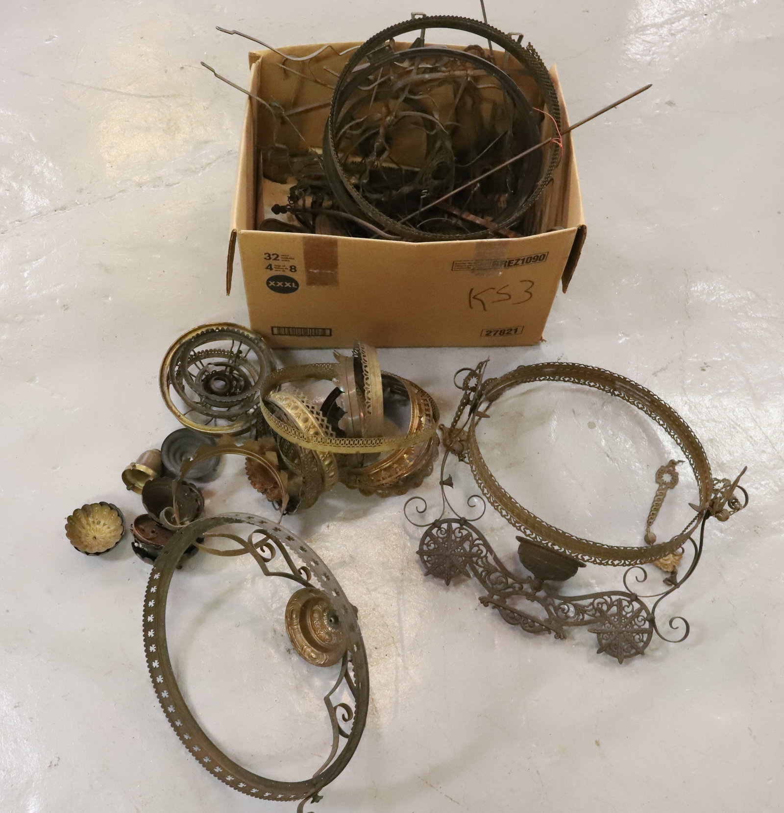 LARGE LOT KEROSENE HANGING LIGHT PARTS SHADE RINGS AND FRAMES: BRASS HANGING LIGHT FRAMES, SHADE RINGS, BRASS SMOKING BELLS, APPROXIMATELY 25 LBS 21"H X 21" X 15" PLEASE READ CAREFULLY - Terms for Purchasing and Shipping of Auction Items. Please read carefully be