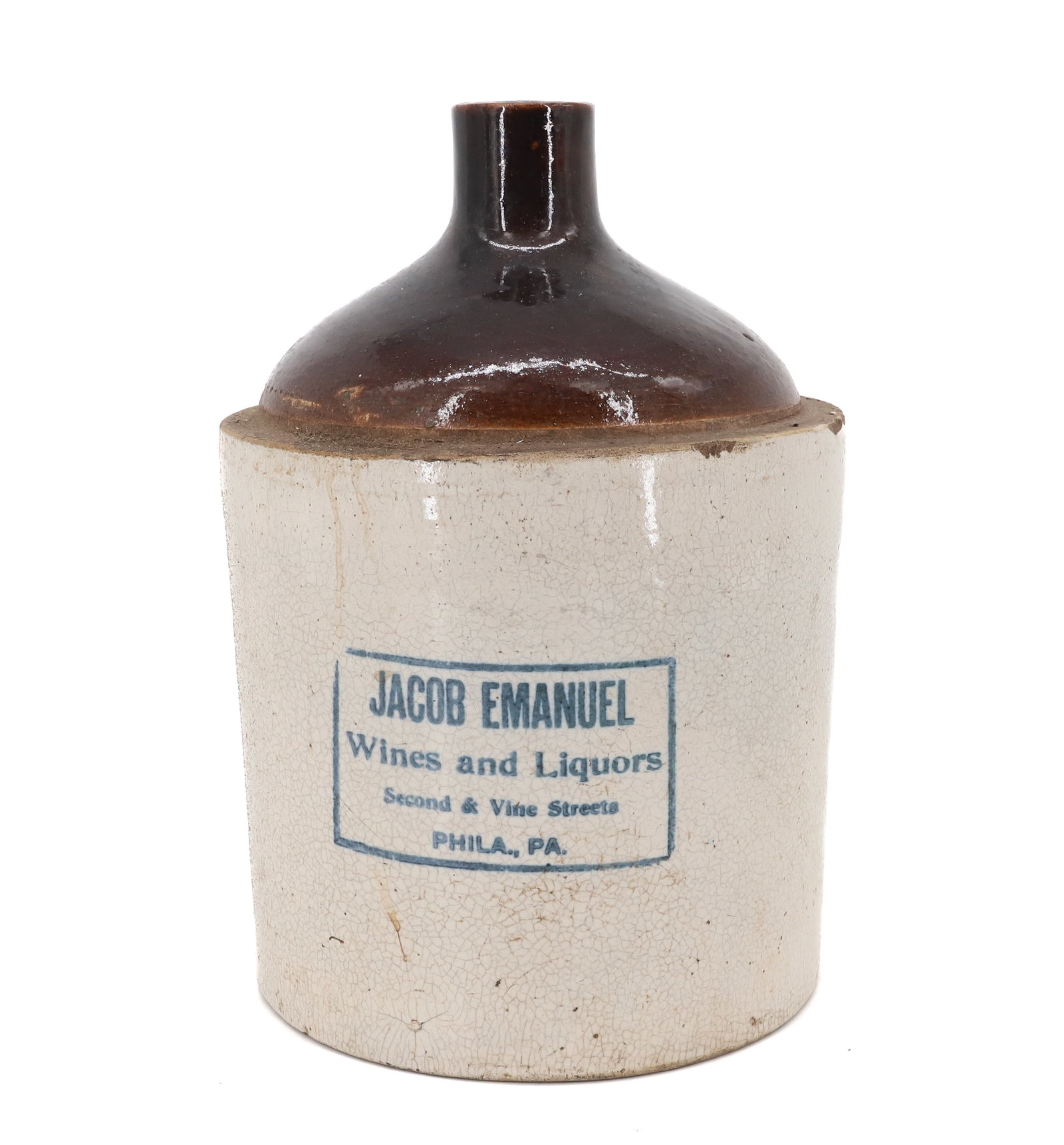 PHILADELPHIA, PA ADVERTISING JUG: BLUE STAMPED "JACOB EMANUEL, WINES AND LIQUOR" 10 1/4" H. Terms: PLEASE READ CAREFULLY - Terms for Purchasing and Shipping of Auction Items. Please read carefully before bidding. All payments for purc