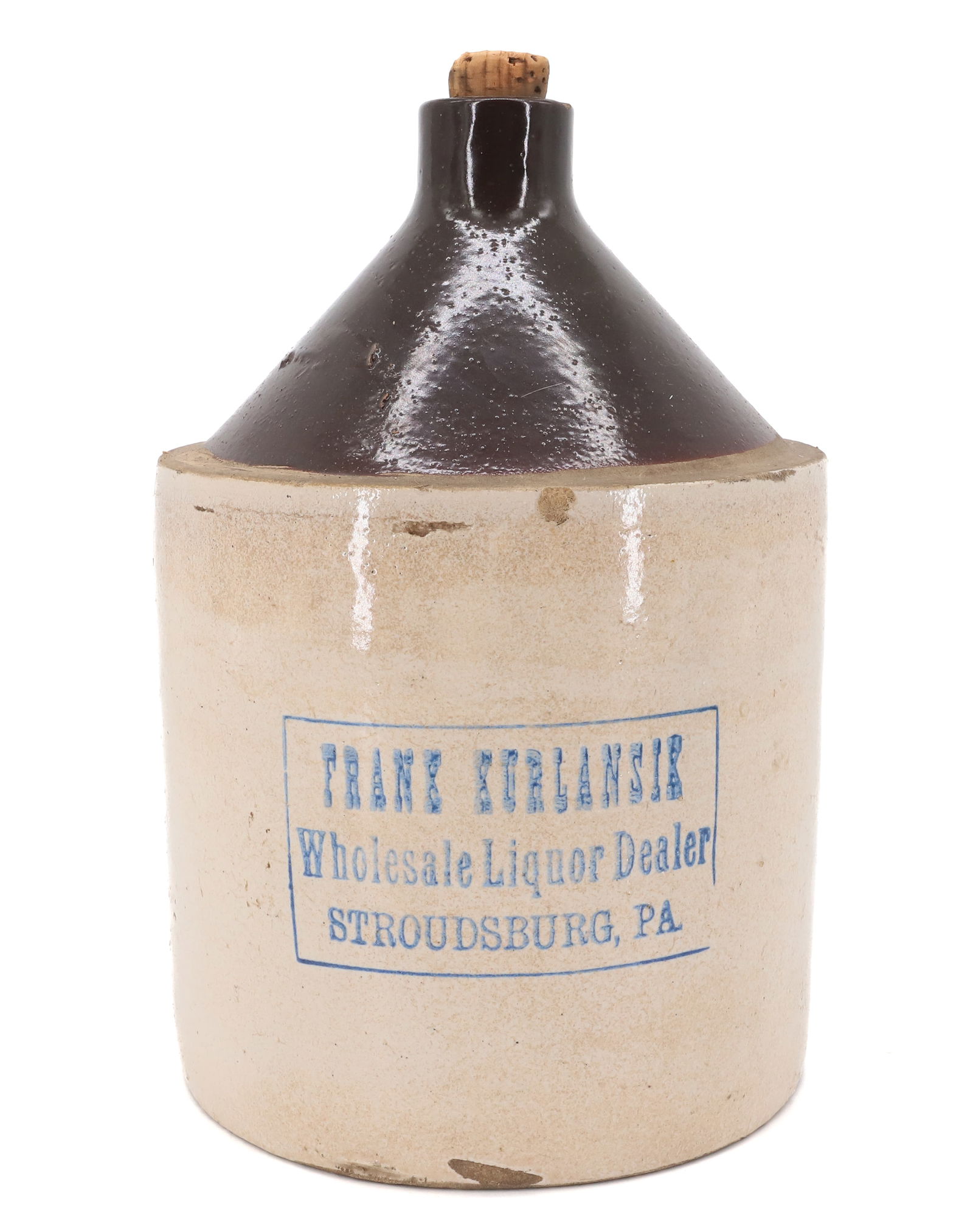 STROUDSBURG, PA ADVERTISING JUG: BLUE STAMPED "FRANK KURLANSIK, WHOLESALE LIQUOR DEALER" 8 1/2" H. Terms: PLEASE READ CAREFULLY - Terms for Purchasing and Shipping of Auction Items. Please read carefully before bidding. All payments