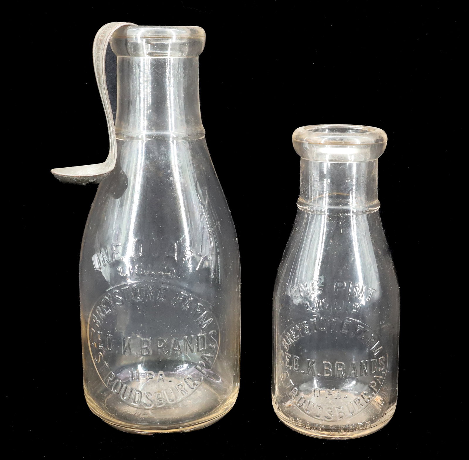 (2) STROUDSBURG, PA MILK BOTTLES: BREYSTONE FARM, GEO. K. BRANDS. PINT, QUART AND CREAM TOP SPOON. 7 1/4" TO 9 1/2". Terms: PLEASE READ CAREFULLY - Terms for Purchasing and Shipping of Auction Items. Please read carefully before biddi