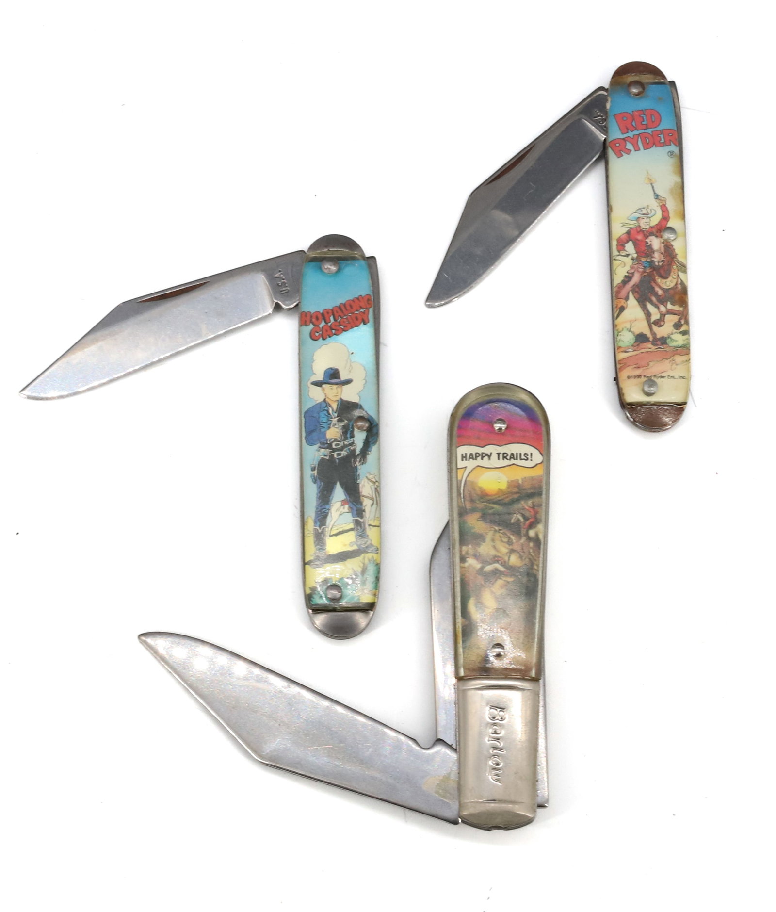 LOT OF "COWBOY" POCKET KNIVES: RED RYDER, HOPALONG CASSIDY AND ROY ROGERS/DALE EVANS. Terms: PLEASE READ CAREFULLY - Terms for Purchasing and Shipping of Auction Items. Please read carefully before bidding. All payments for purchas