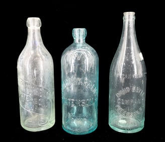 (3) PATERSON, NJ EMBOSSED BOTTLES