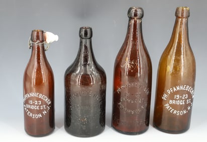 LOT OF AMBER ADVERTISING BOTTLES