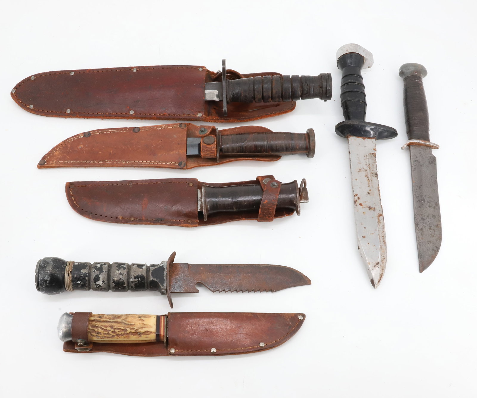 ASSORTMENT OF KNIVES: (7) TOTAL. SOME WITH SHEATHS. LARGEST MRKD. NESCO, JAPAN 12 1/4" TOTAL LENGTH. BRANDS: WESTERN, NESCO, PAL, SOLINGEN, AND MORE. Terms: PLEASE READ CAREFULLY - Terms for Purchasing and Shipping of Auct