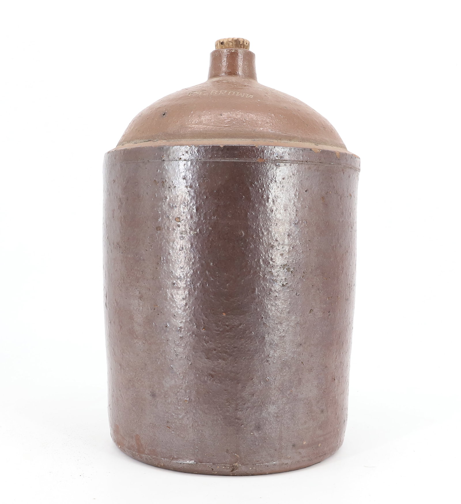 E.C. BROWN (GEORGIA) STONEWARE JUG: BROWN GLAZED POTTERY JUG IMPRESSED AT TOP "E.C. BROWN". 13 3/4" H. PLEASE READ CAREFULLY - Terms for Purchasing and Shipping of Auction Items. Please read carefully before bidding. All payments for pu