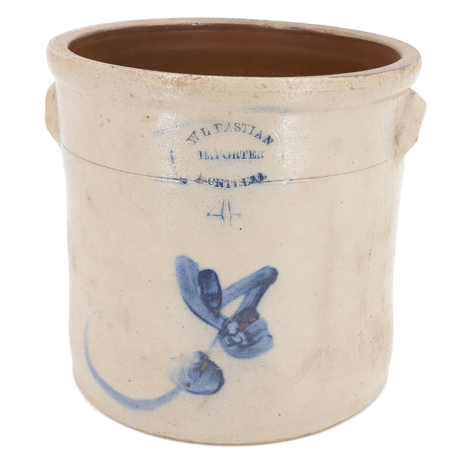 FOUR-GALLON BLUE DECORATED CROCK: BLUE FLORAL DESIGN, IMPRESSED "W.L. BASTIAN, IMPORTER, MONTREAL". 11" X 11 1/4". PLEASE READ CAREFULLY - Terms for Purchasing and Shipping of Auction Items. Please read carefully before bidding. All p