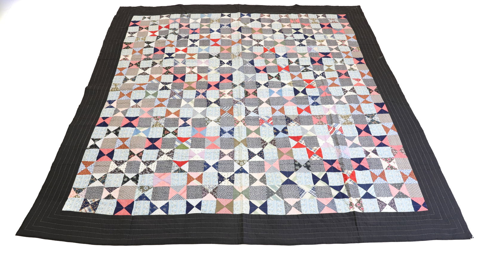 VINTAGE HAND STITCHED QUILT: SQUARES/TRIANGLES PATTERN. BLACK BORDER. THIN BATTING. 87" X 84". PLEASE READ CAREFULLY - Terms for Purchasing and Shipping of Auction Items. Please read carefully before bidding. All payments for pur
