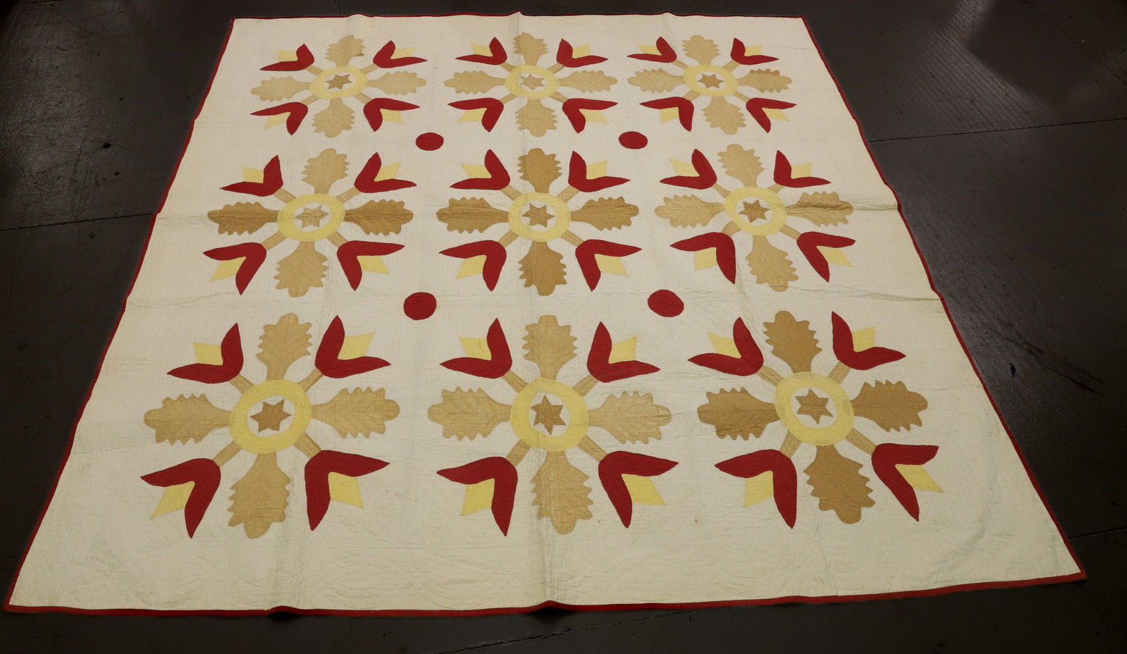 VINTAGE HAND STITCHED QUILT: TULIP PATTERN WITH CENTRAL STARS - RED, YELLOW, AND BROWN - 80" X 80" PLEASE READ CAREFULLY - Terms for Purchasing and Shipping of Auction Items. Please read carefully before bidding. All payments for