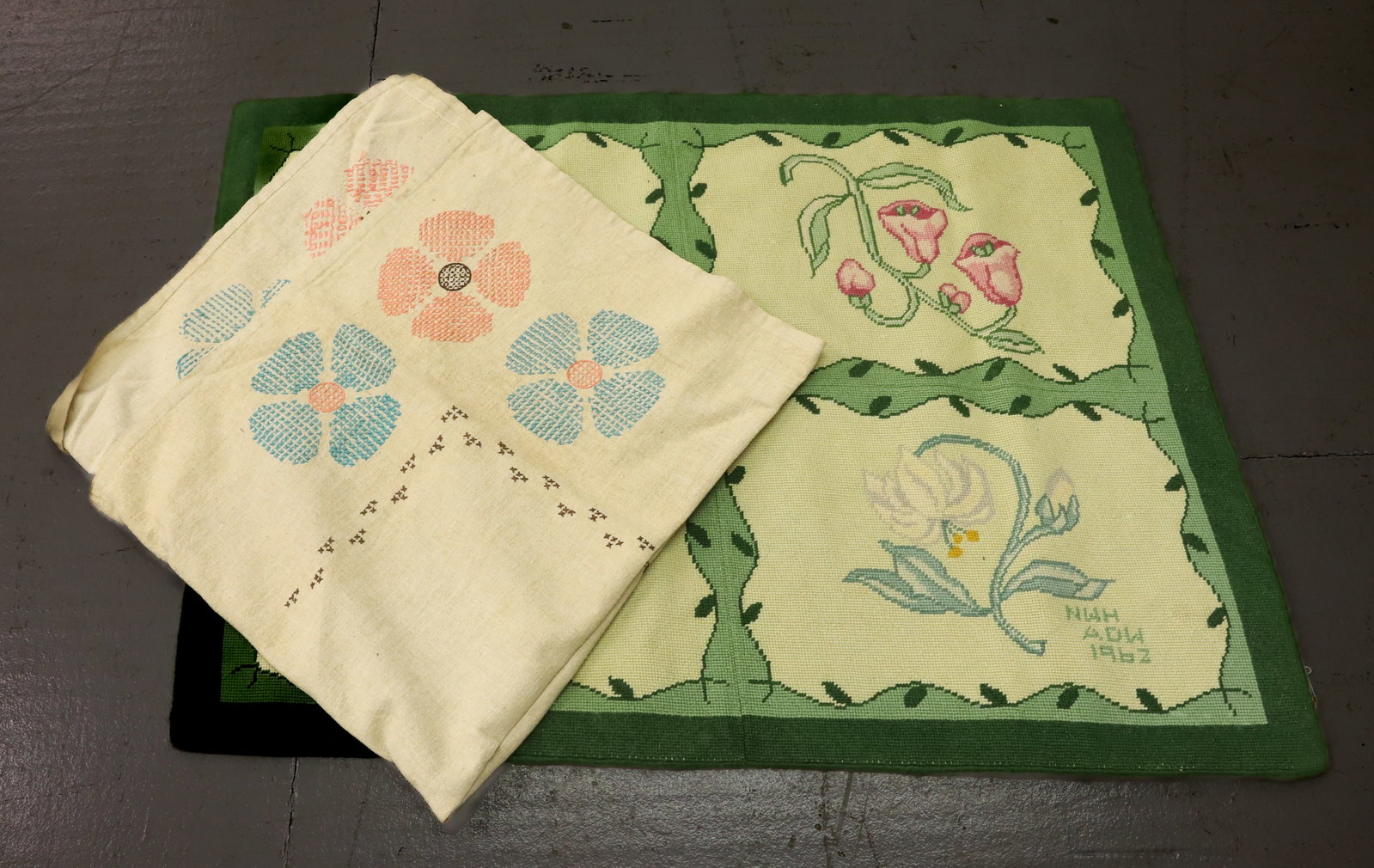 NEEDLE POINT RUG AND TABLE COVERING: FLORAL DESIGN RUG, DATED 1962 WITH INITIALS "NWH" "ADW", 29" X 39" WITH FLORAL PATTERN TABLE COVERING 45" X 42" PLEASE READ CAREFULLY - Terms for Purchasing and Shipping of Auction Items. Please read 