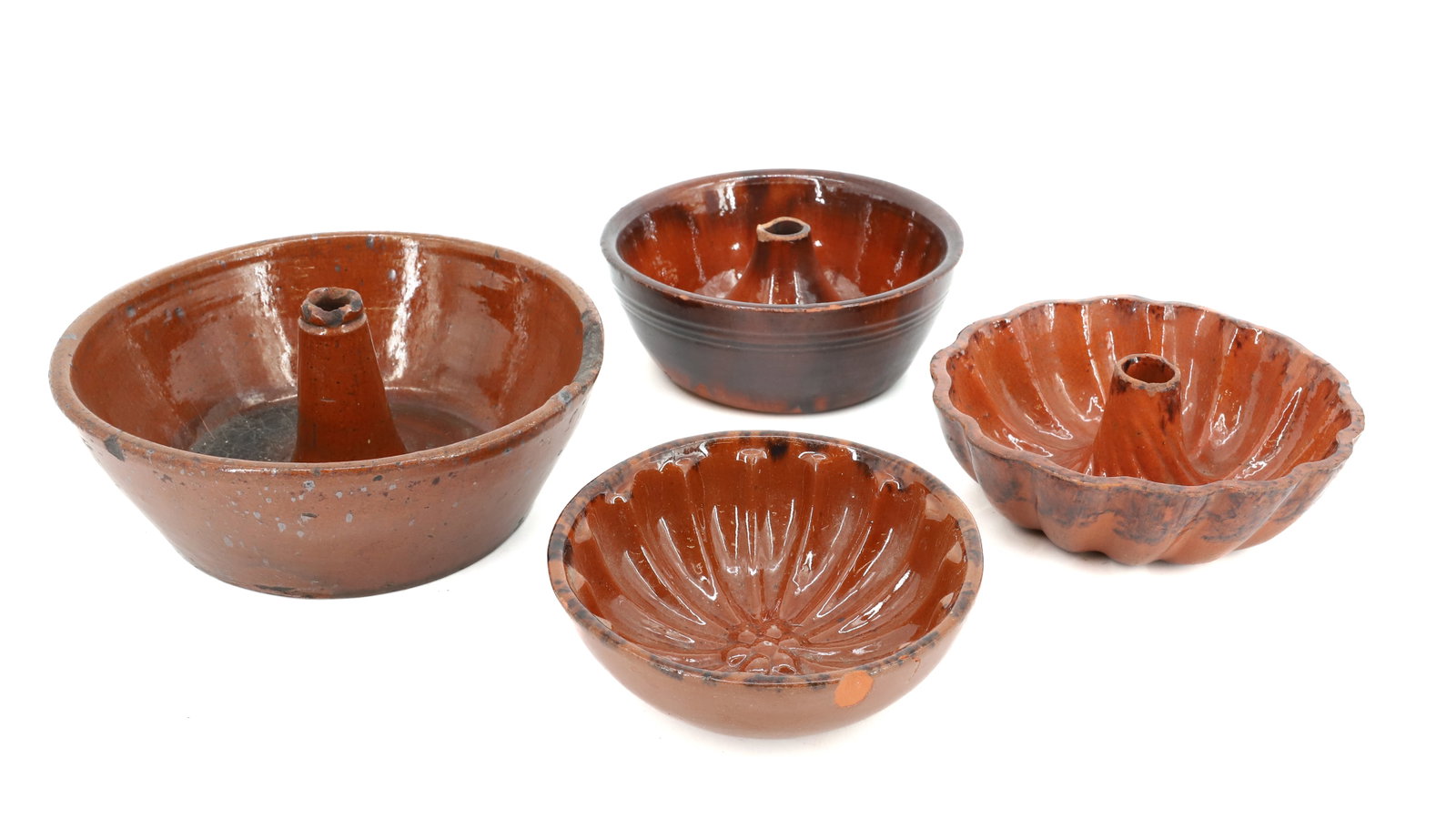 LOT OF REDWARE FOOD MOLDS: (4) VARIOUS GLAZED FOOD MOLDS - 5 1/2" TO 7" DIAMETERS PLEASE READ CAREFULLY - Terms for Purchasing and Shipping of Auction Items. Please read carefully before bidding. All payments for purchases will