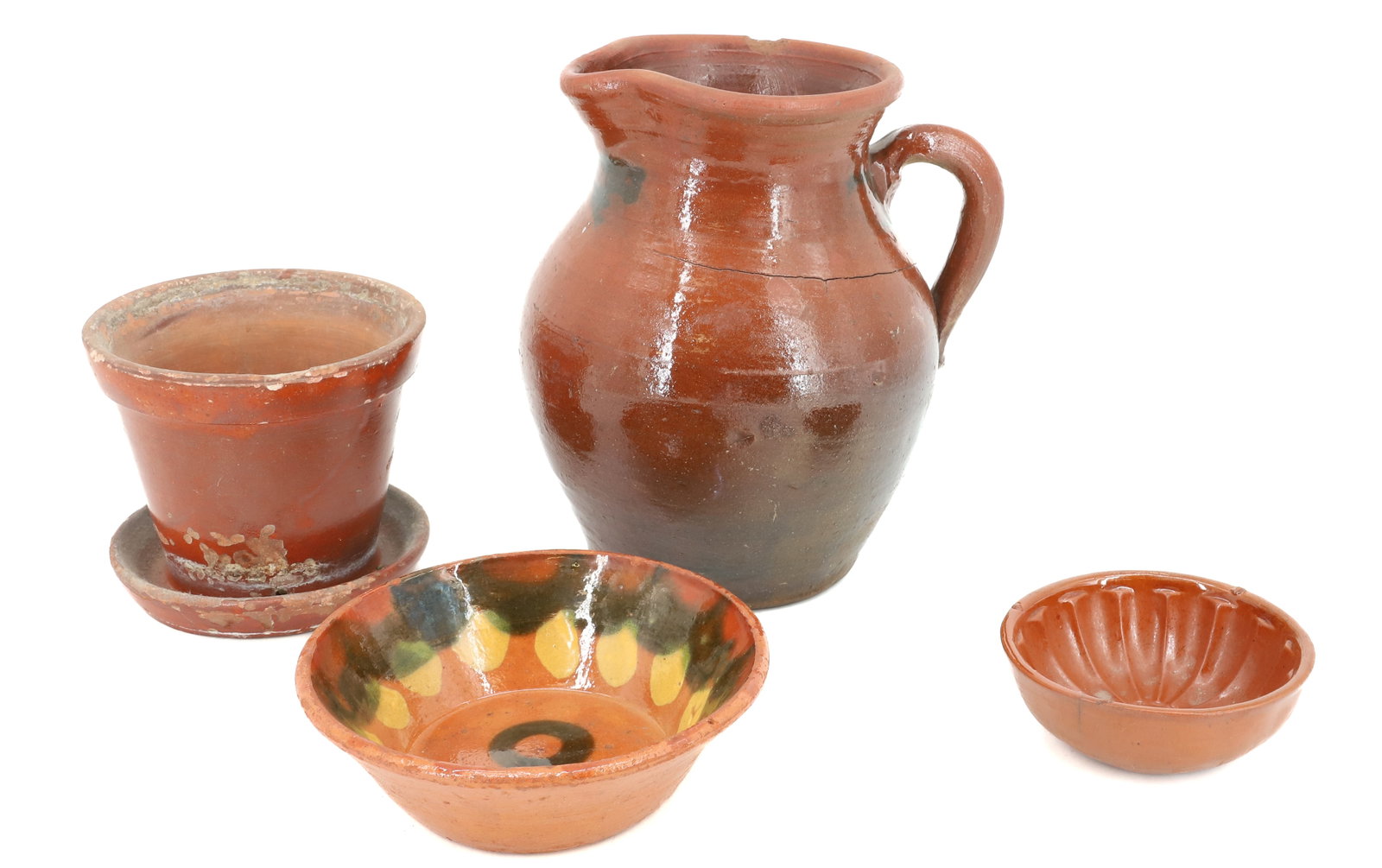 LOT OF REDWARE: INCLUDING; GLAZED PITCHER, FLOWER POT, DECORATED BOWL, AND FOOD MOLD - PITCHER IS 8 1/2" H - BOWL 6 1/4" D PLEASE READ CAREFULLY - Terms for Purchasing and Shipping of Auction Items. Please read caref
