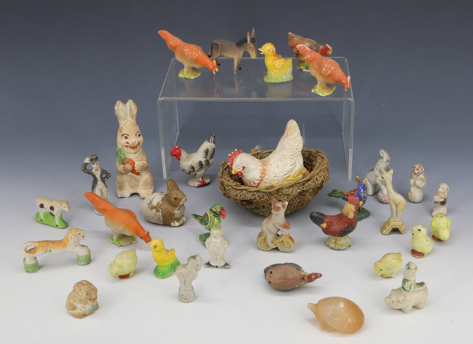 LOT OF CHALKWARE AND BISQUE ANIMALS: INCLUDING; HEN IN NEST (4 1/2" D), CIRCUS PERFORMERS, ROOSTER/HENS, AND MORE PLEASE READ CAREFULLY - Terms for Purchasing and Shipping of Auction Items. Please read carefully before bidding. All payme