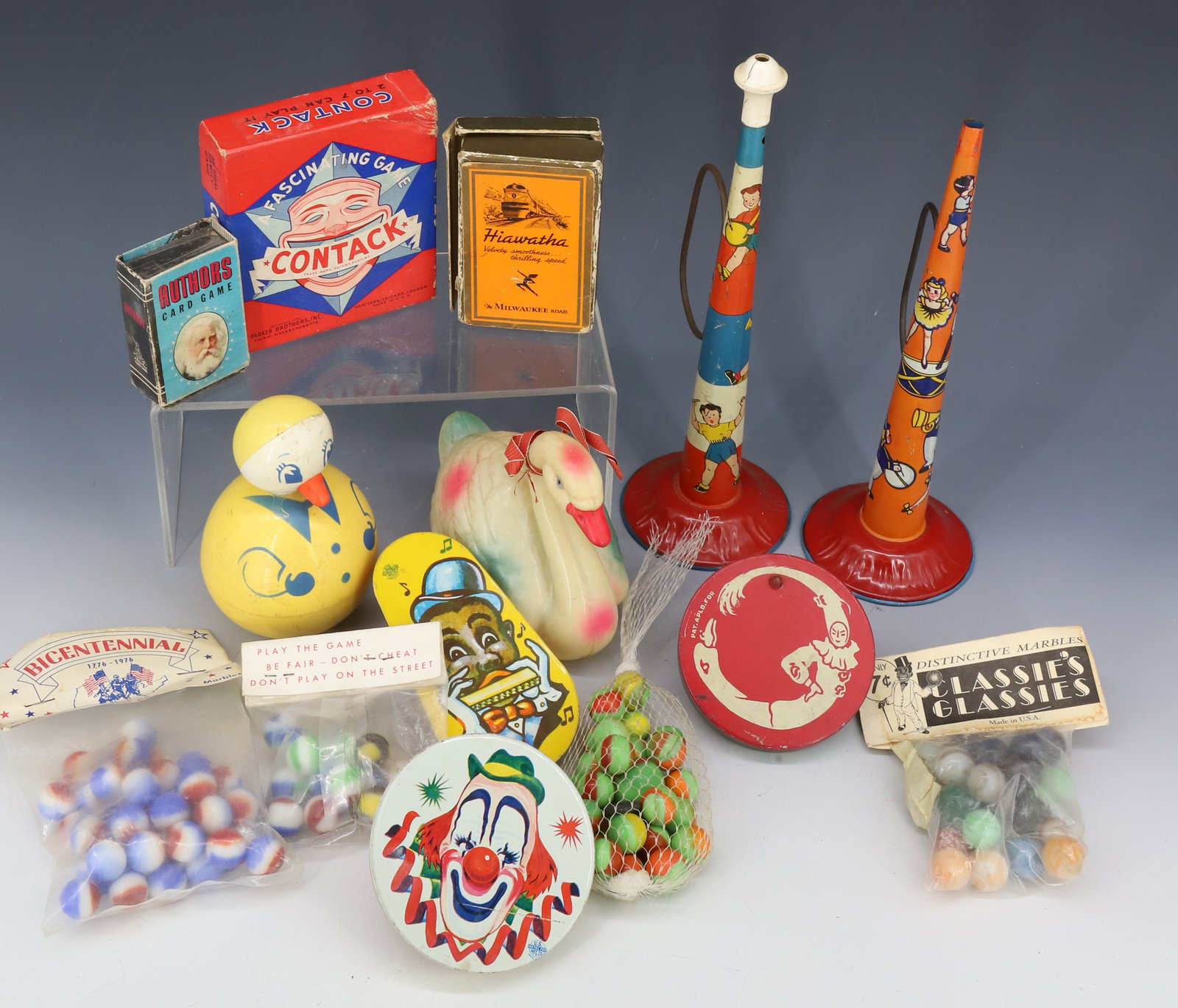 LOT OF VINTAGE TOYS: INCLUDING; CARD GAMES, BAGS OF MARBLES, TIN NOISE MAKERS, AND MORE PLEASE READ CAREFULLY - Terms for Purchasing and Shipping of Auction Items. Please read carefully before bidding. All payments for pu