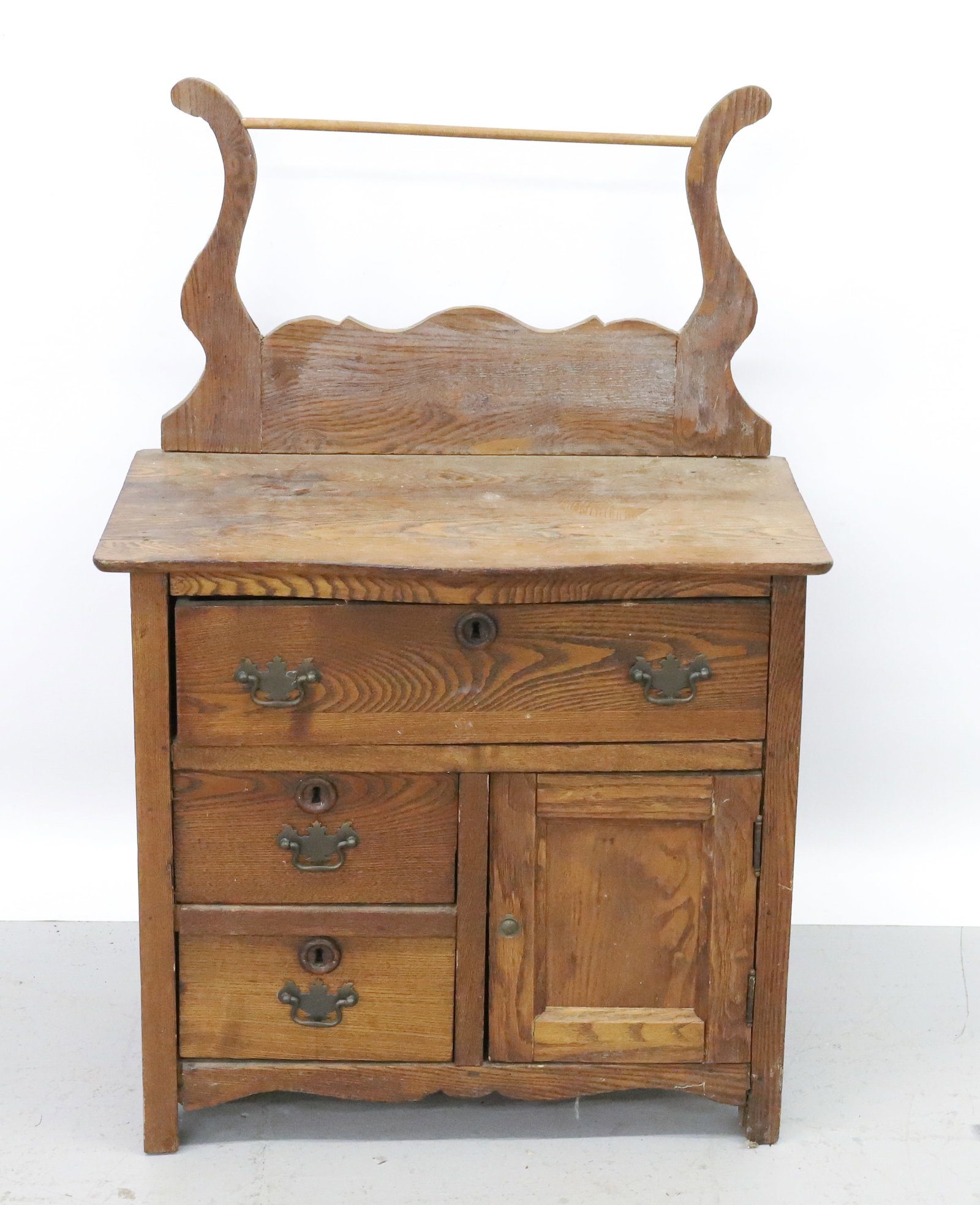CHILD'S MINIATURE WASHSTAND: ONE DRAWER OVER TWO DRAWERS AND DOOR. 32" X 22" X 12". PLEASE READ CAREFULLY - Terms for Purchasing and Shipping of Auction Items. Please read carefully before bidding. All payments for purchases will